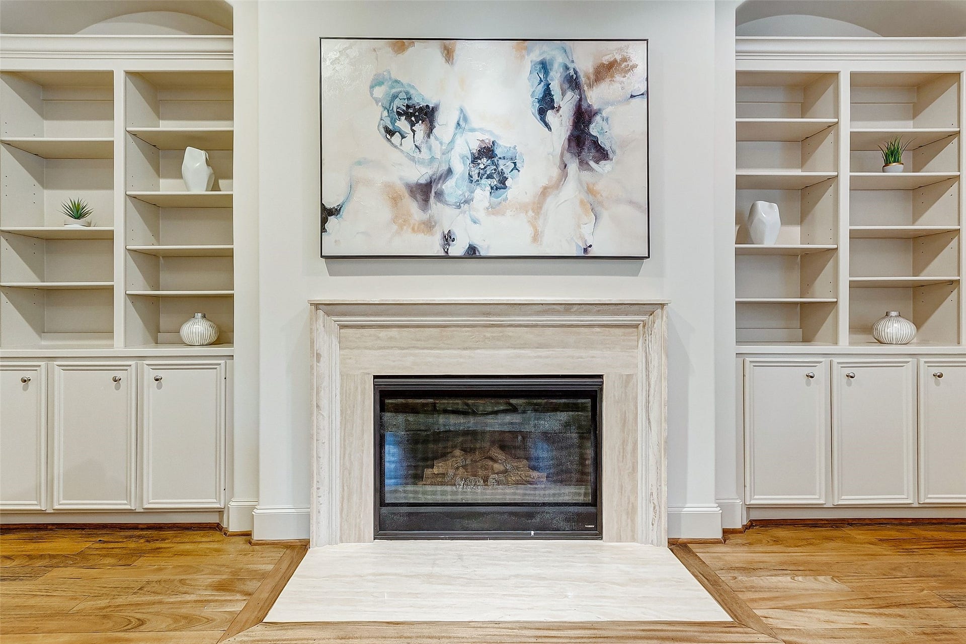 1955 Sheridan Street, Houston, TX 77030 The elegant gas fireplace on the second floor serves as a captivating focal point, infusing the living area with warmth and inviting comfort.