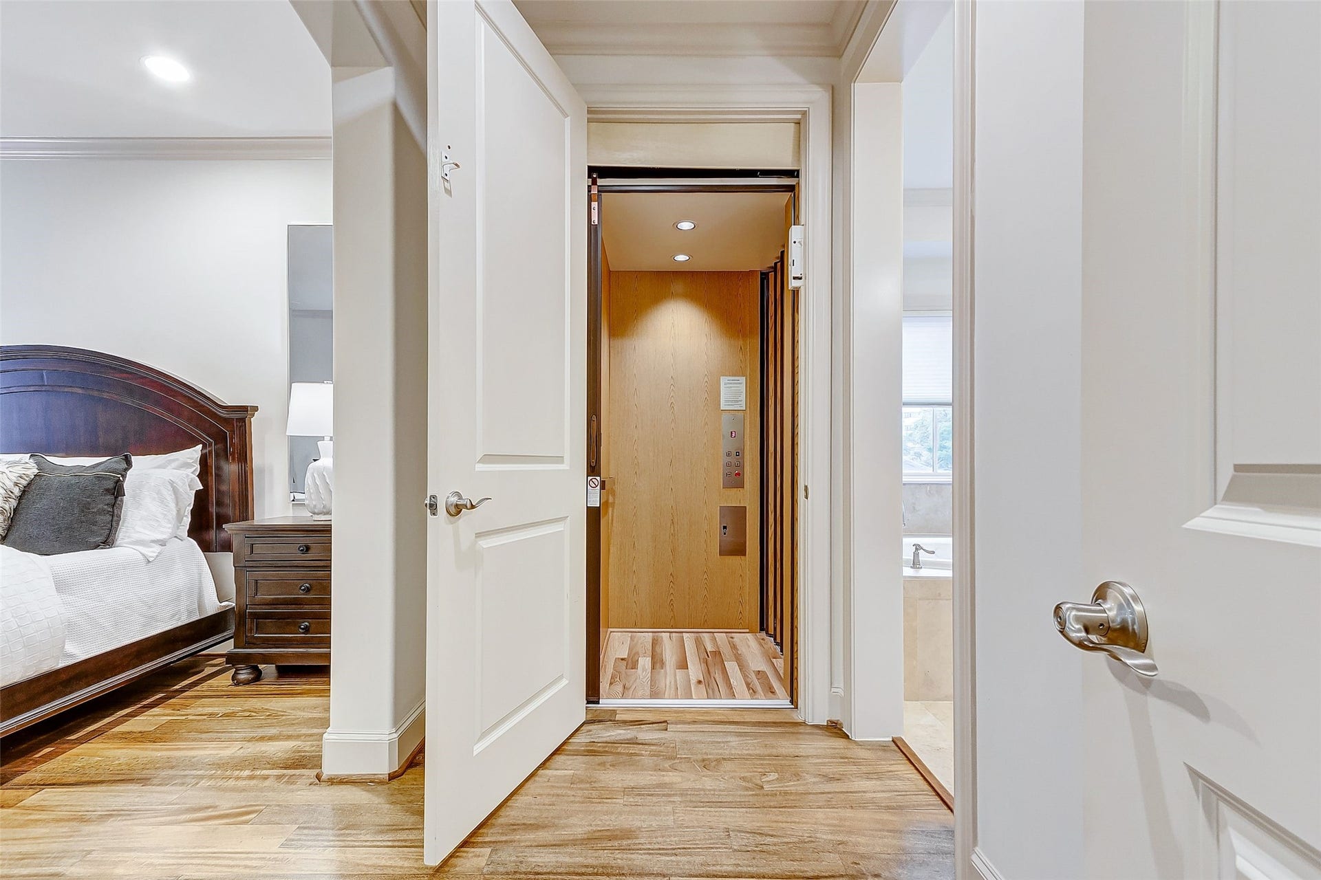 1955 Sheridan Street, Houston, TX 77030 Experience unparalleled convenience in the primary bedroom with direct elevator access, making travel preparation a breezejust load your luggage and go!