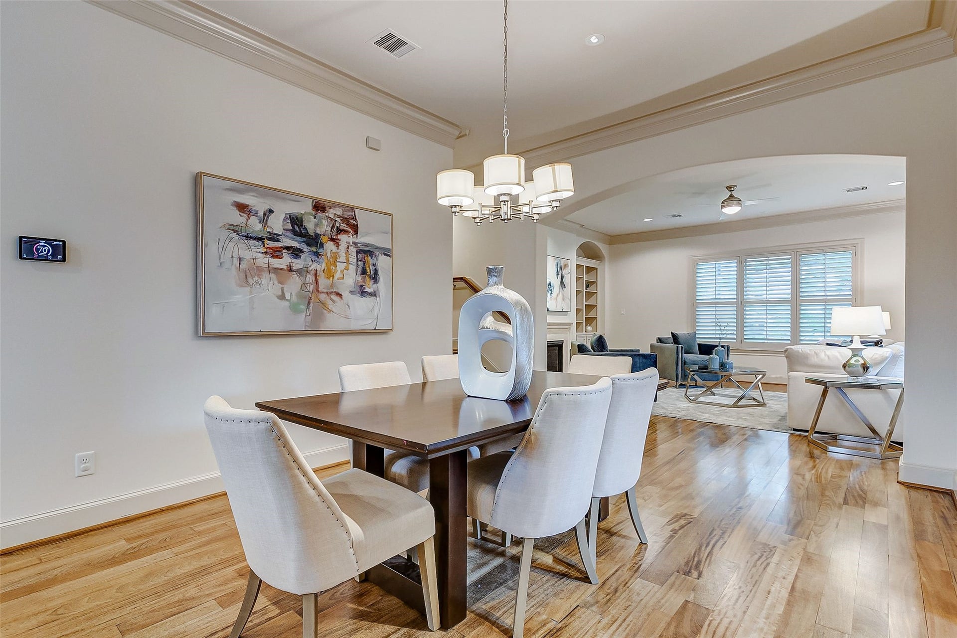 1955 Sheridan Street, Houston, TX 77030 The elegant second-floor dining area offers stunning views and a warm, inviting atmosphere, ideal for memorable gatherings with loved ones.