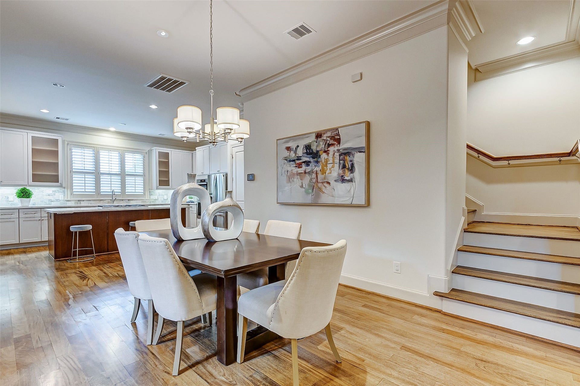 1955 Sheridan Street, Houston, TX 77030 Elegant dining room seamlessly connects to the kitchen, offering effortless convenience for serving meals and entertaining guests.