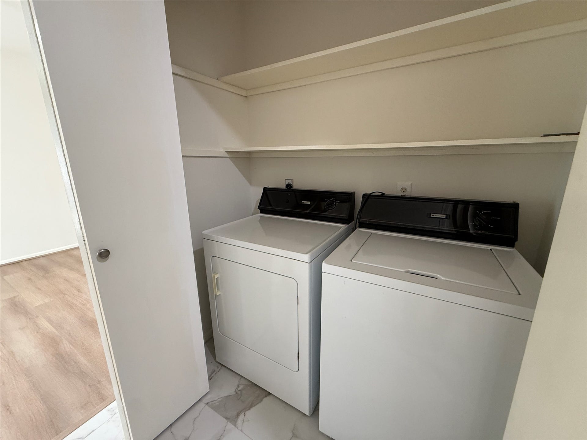 Laundry area with washer & dryer.
