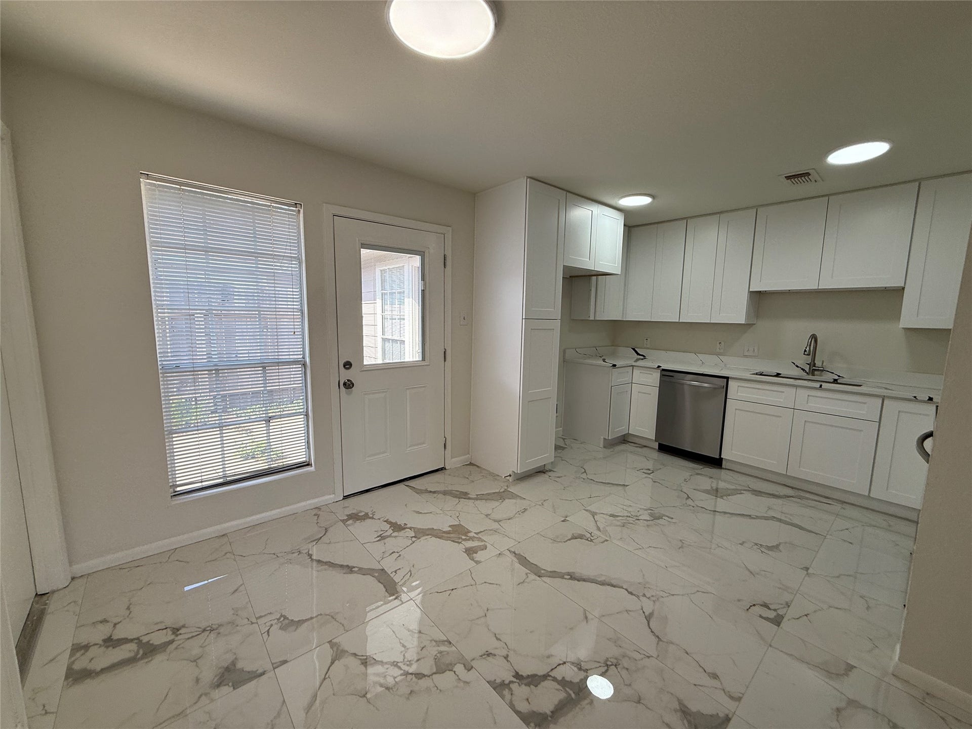 Dining area with access to the back patio.
