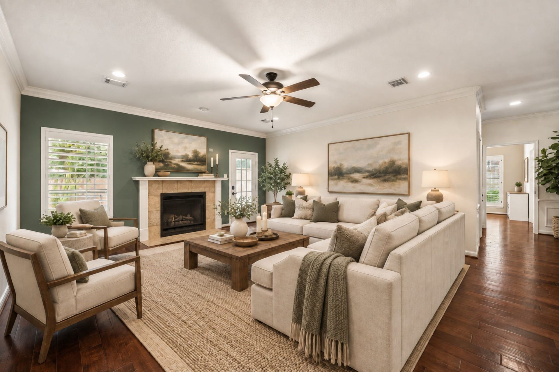 30 SAINT SIMONS COURT, Sugar Land, TX 77479 THE SPACIOUS FAMILY ROOM OFFERS HARDWOOD FLOORING, A GAS FIREPLACE, RECESSED LIGHTING, AND PLANTATION SHUTTERS. **Virtually Staged.