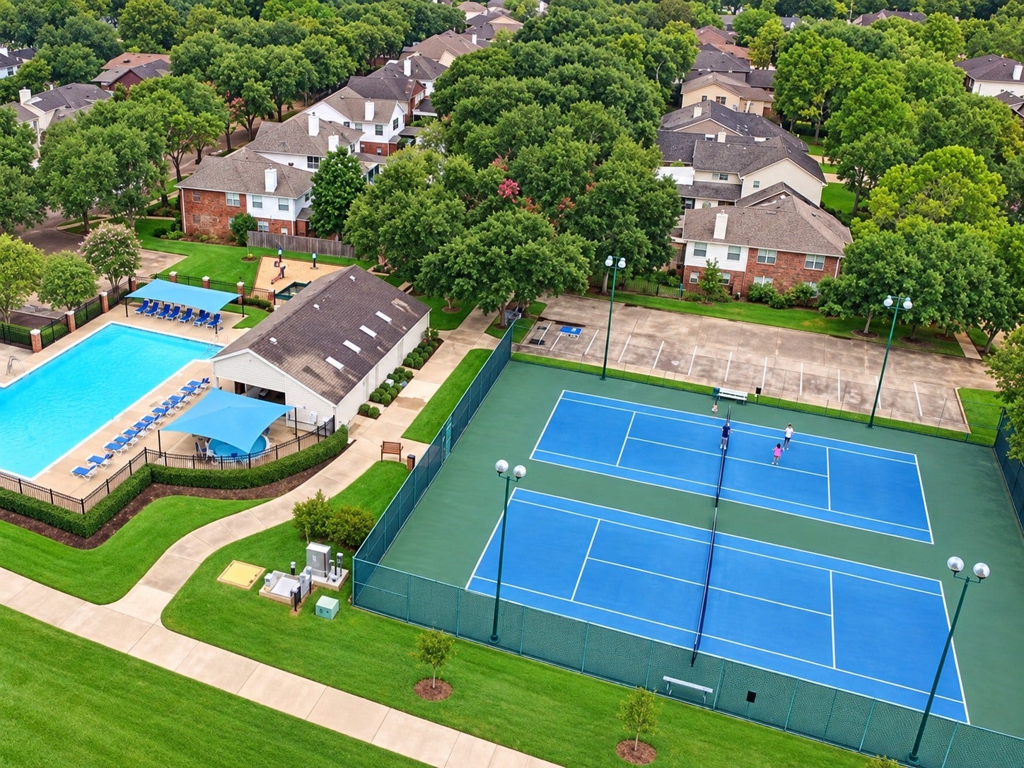 30 SAINT SIMONS COURT, Sugar Land, TX 77479 ENJOY COMMUNITY AMENITIES INCLUDING TENNIS COURTS, A SPACIOUS POOL, AND RECREATIONAL AREAS.