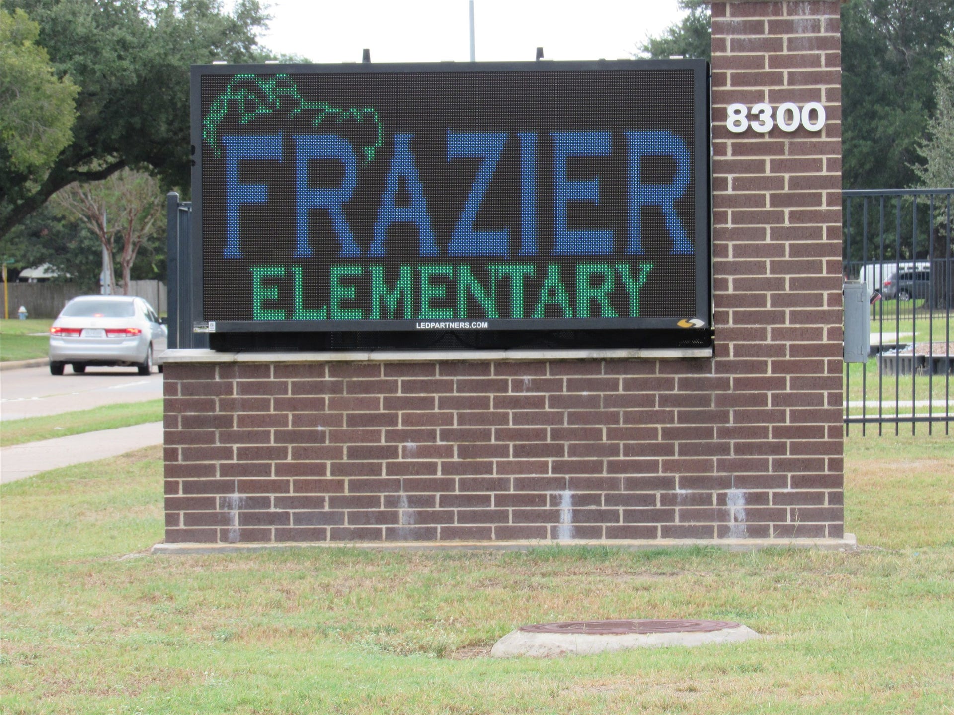 Sign of Frazier Elementary School in subdivision.