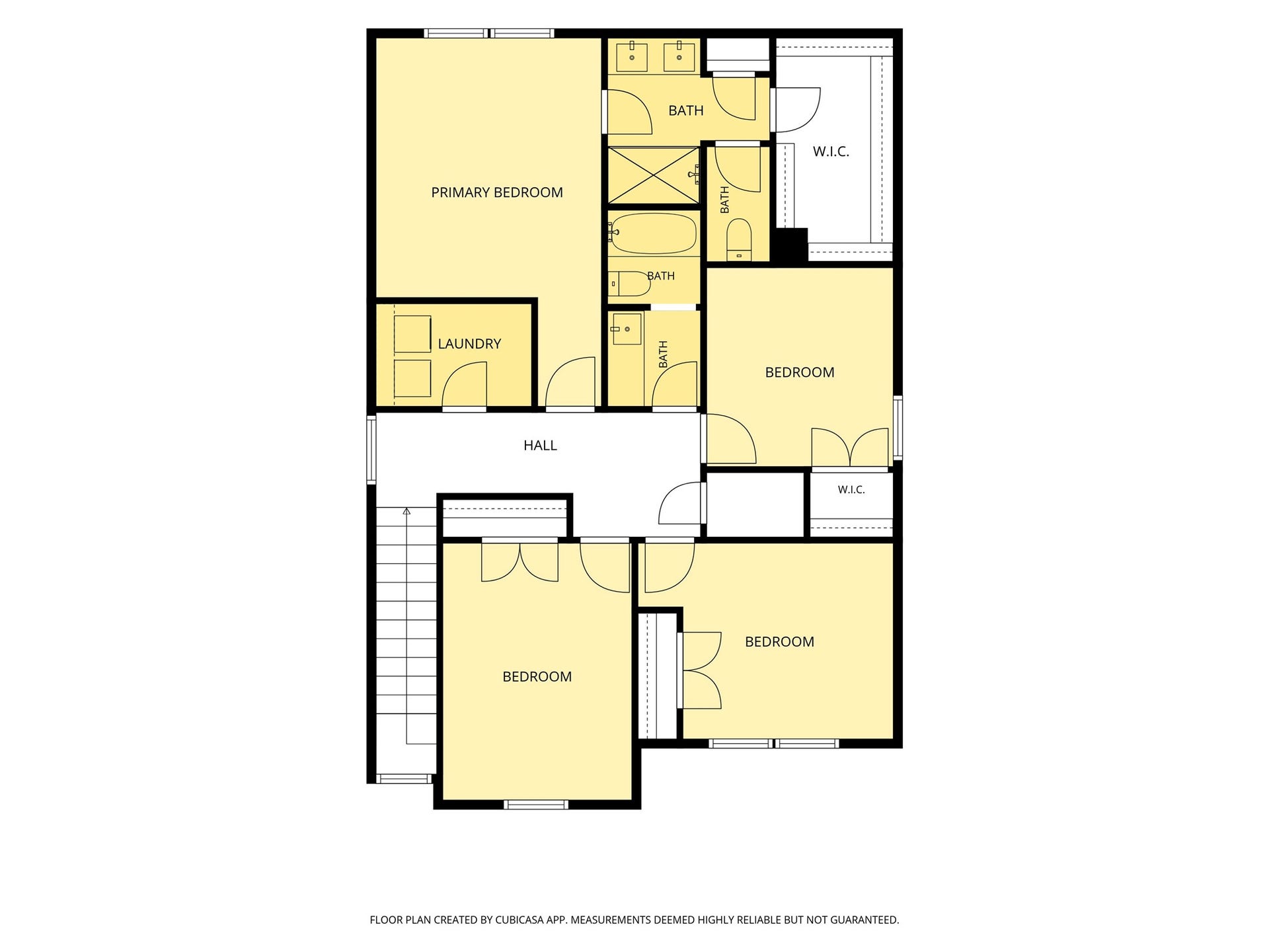 Spacious upper level featuring a primary bedroom with en-suite bath and walk-in closet, three additional bedrooms, two more bathrooms, and a convenient laundry room.