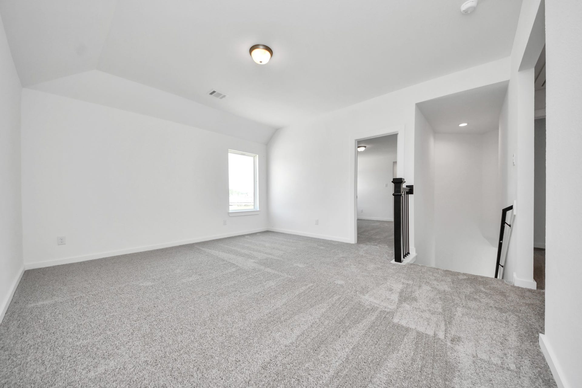 3072 Spoolwood Trail, Magnolia, TX 77355 Come upstairs and enjoy a day of leisure in this fabulous game room! This is the perfect hangout spot or adult game room! Features plush carpet, high ceilings, custom paint and windows for plenty of natural light.