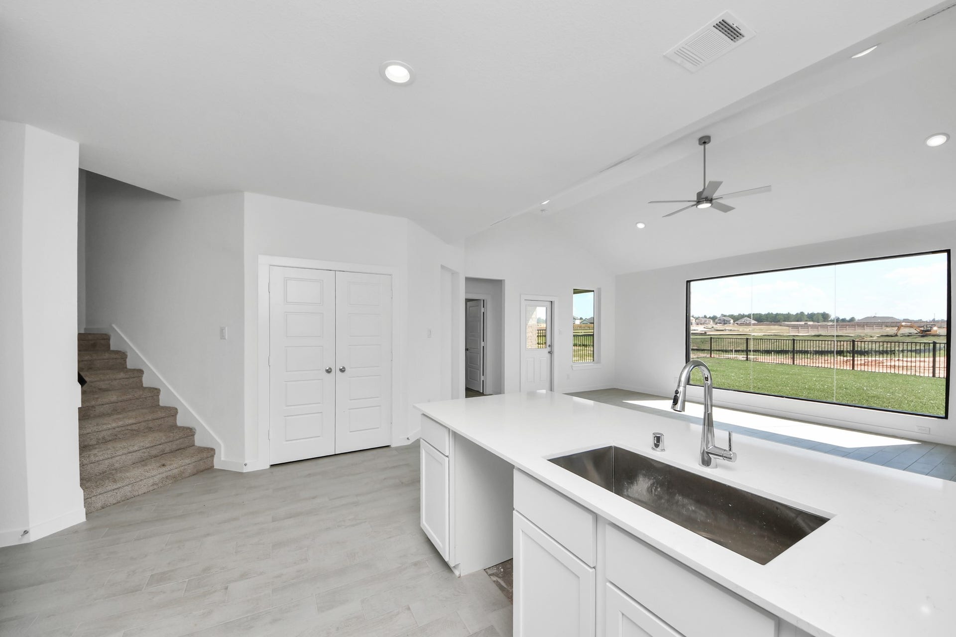 3072 Spoolwood Trail, Magnolia, TX 77355 All of this overlooks your expansive family room, creating a perfect space for culinary delights and family gatherings.
