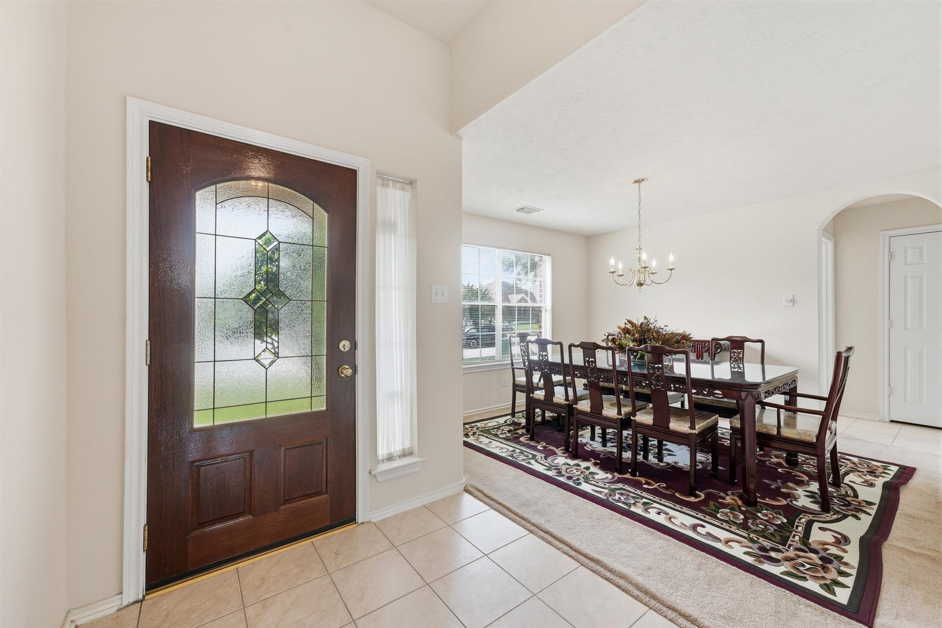 2426 Floral Ridge Drive, Spring, TX 77388 Step through the elegant front door into a bright, inviting formal dining room perfect for entertaining.