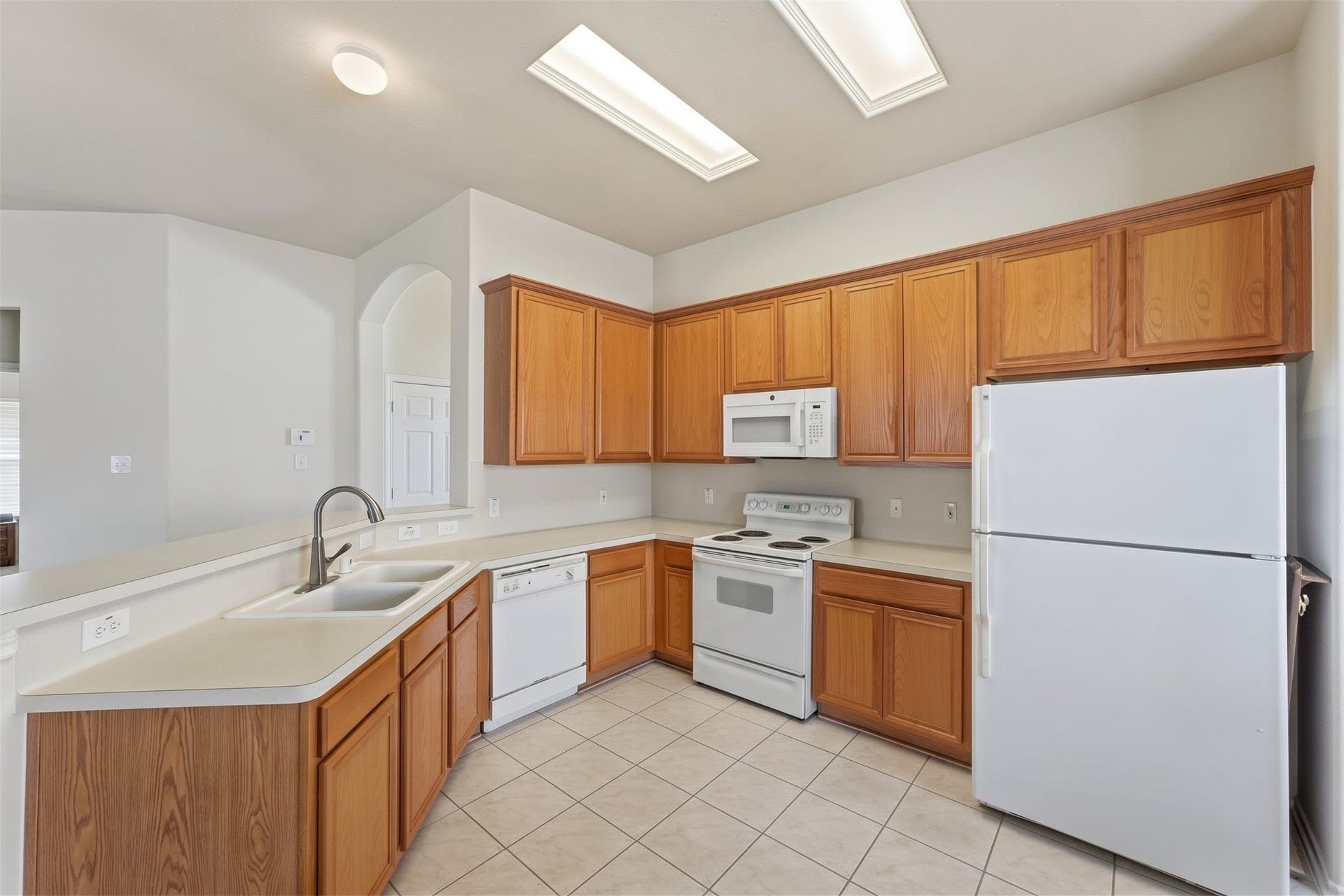2426 Floral Ridge Drive, Spring, TX 77388 Bright kitchen with ample cabinetry, and a convenient layout perfect for cooking and entertaining.