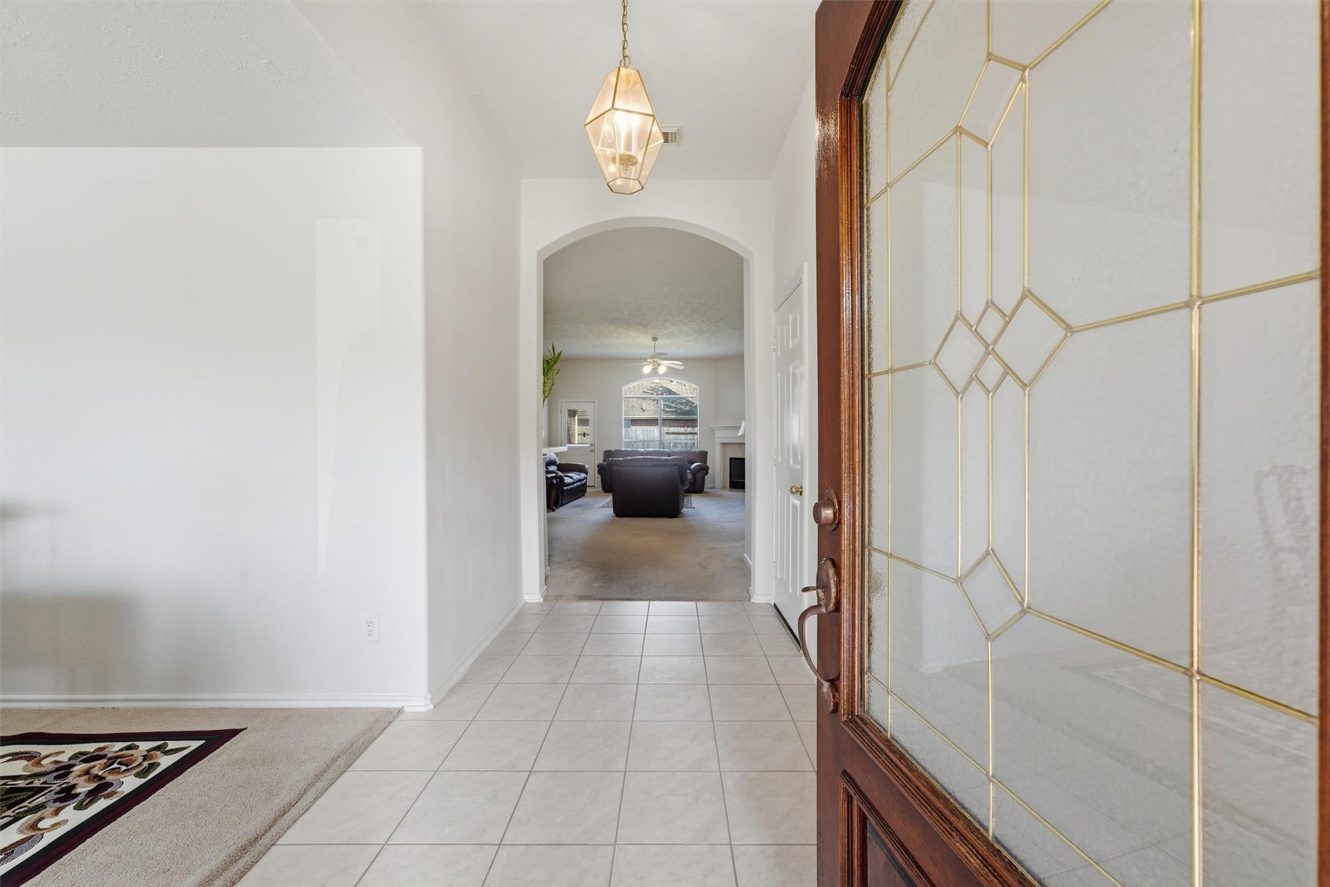 2426 Floral Ridge Drive, Spring, TX 77388 Step through the inviting foyer that seamlessly guides you into the elegant formal dining room and cozy living room, perfect for entertaining and relaxation.