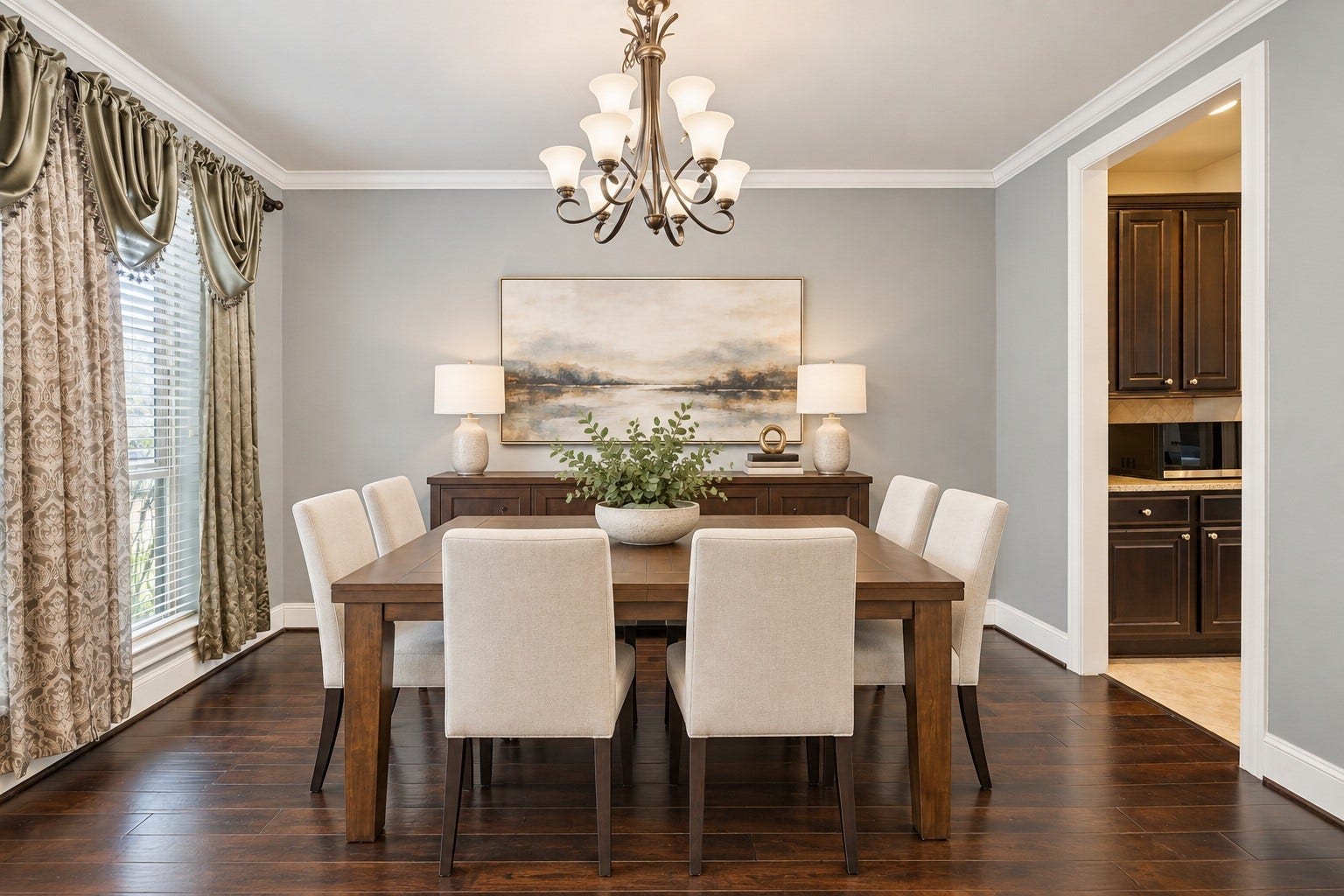 Flowing effortlessly from the entry, this elegant formal dining room features sophisticated crown molding and polished tile floors. This space has been virtually staged to showcase its grand potential for hosting memorable dinners and holiday gatherings.