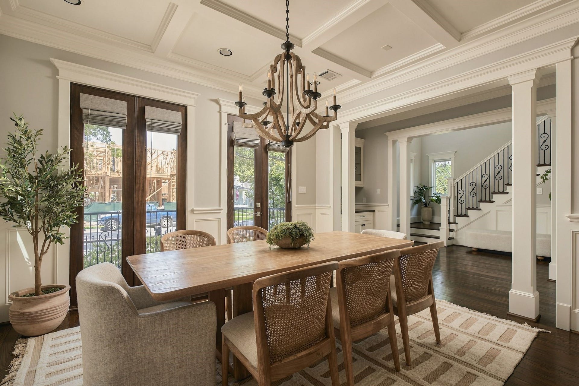 2012 Harvard Street, Houston, TX 77008 Double doors swing open directly to the porch, allowing for a seamless indoor-outdoor flow during dinner parties or festive gatherings.