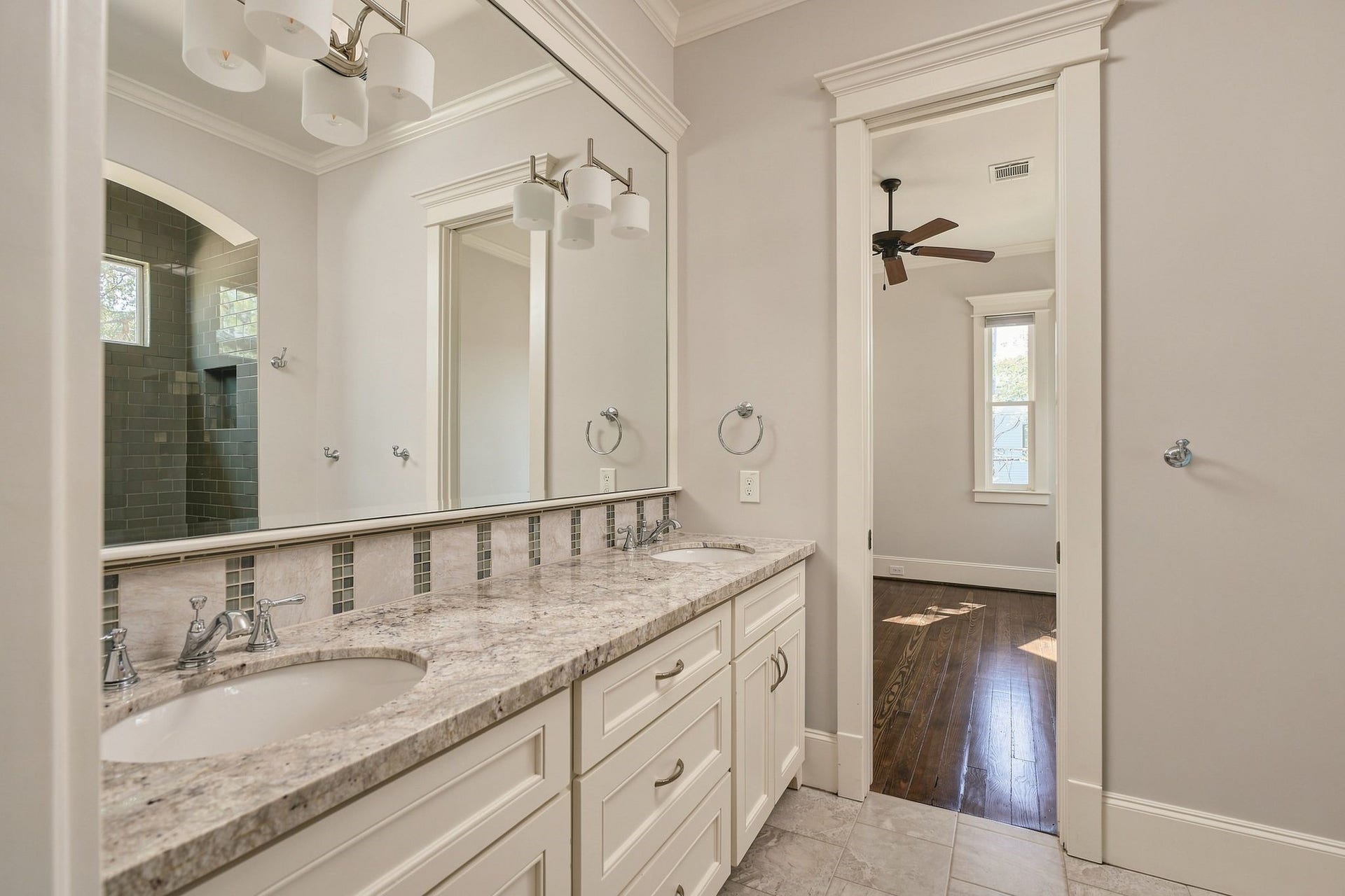 2012 Harvard Street, Houston, TX 77008 The second floor guest bathroom is anchored by a vanity with dual sinks that makes morning routines feel effortless. Youll find high-quality finishes at every turn, from the polished fixtures to the meticulous tilework, all reflecting a sophisticated aesthetic that will never go out of style.