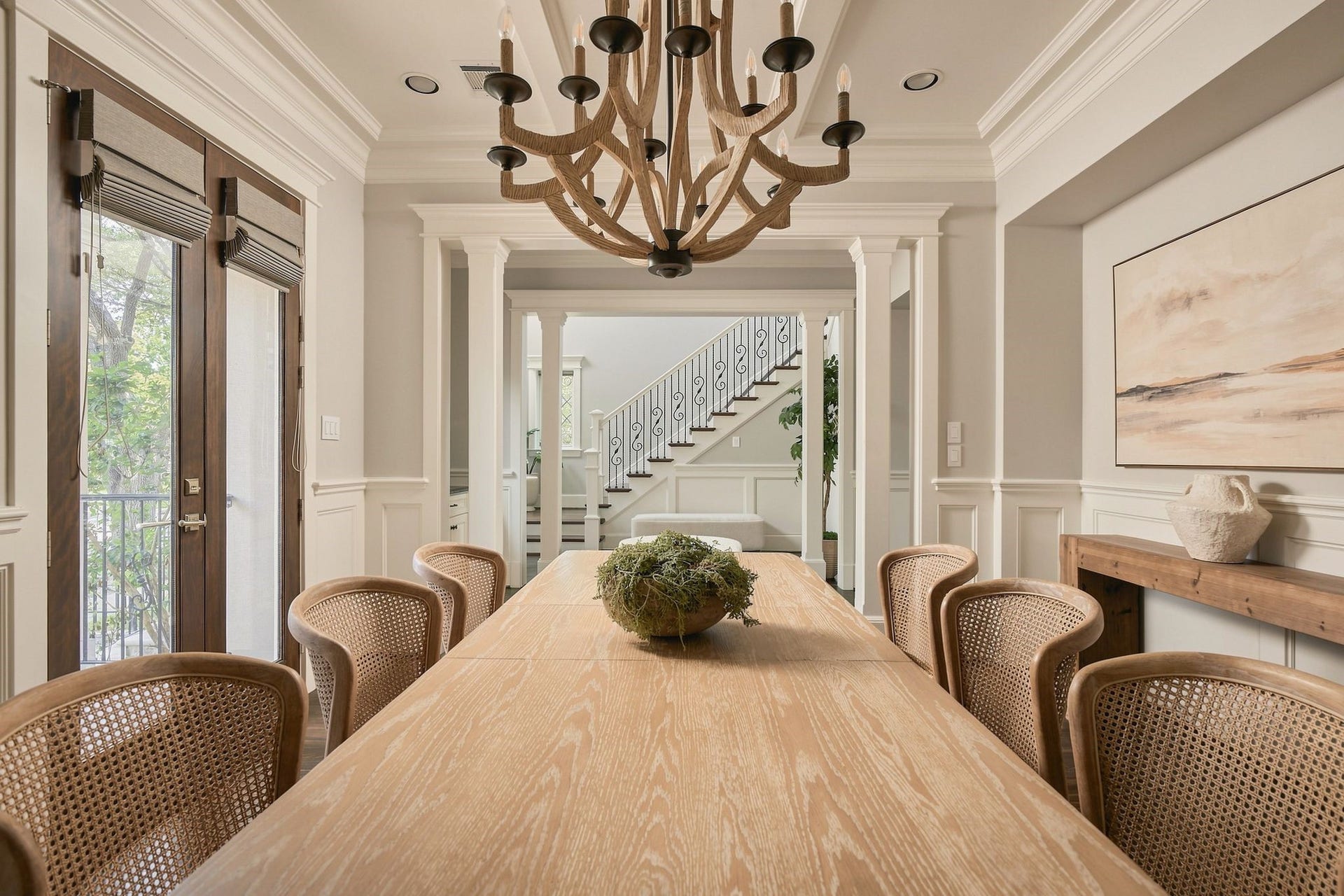 2012 Harvard Street, Houston, TX 77008 The formal dining room serves as a true centerpiece for entertaining, anchored by elegant coffered ceilings and intricate custom trim work.