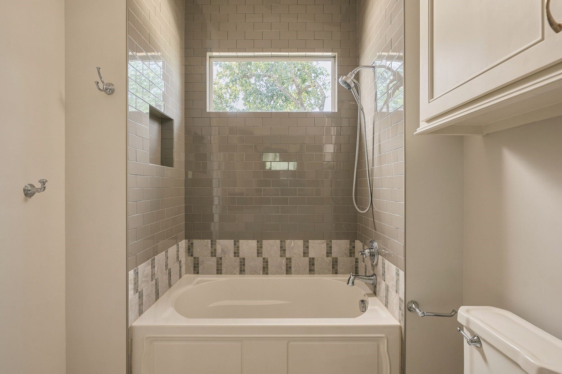 2012 Harvard Street, Houston, TX 77008 The centerpiece is a deep soaking tub, perfect for unwinding after a long day.