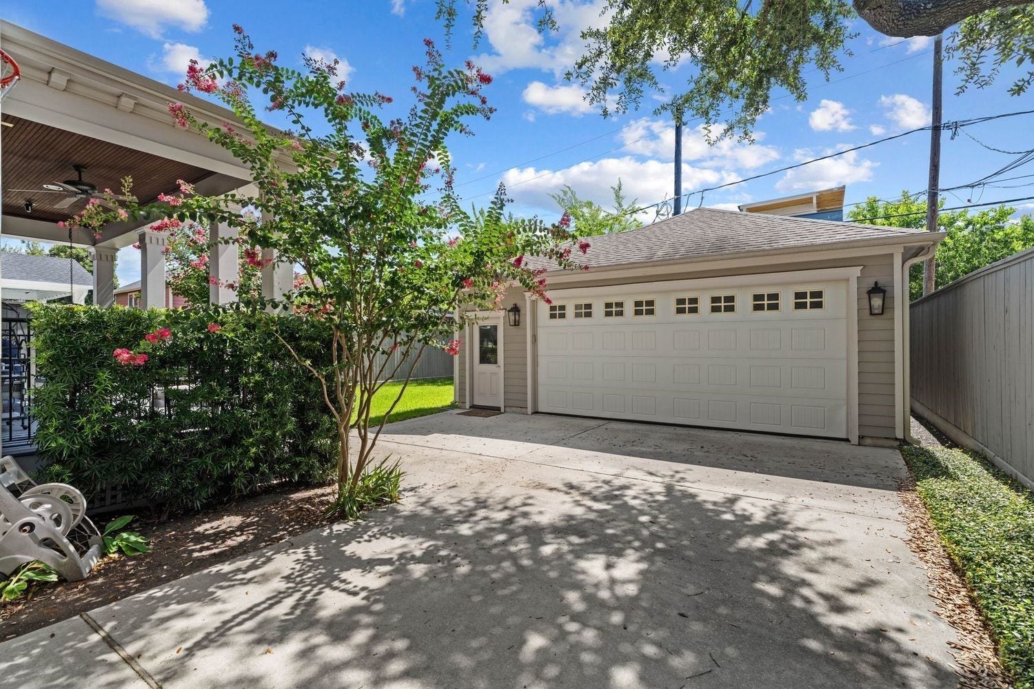 2012 Harvard Street, Houston, TX 77008 A long, private driveway leads you away from the street to a two-car detached garage with epoxy flooring, providing a secure and discreet place to house your vehicles.