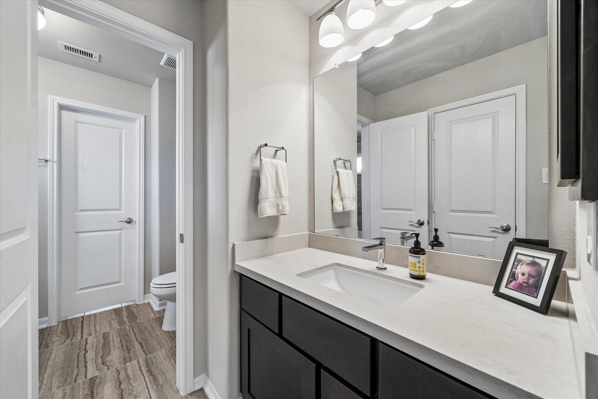 21322 Prairie Plains Lane, Richmond, TX 77406 Secondary bathroom features quartz counters, tile, and separate vanity areas for secondary bedrooms