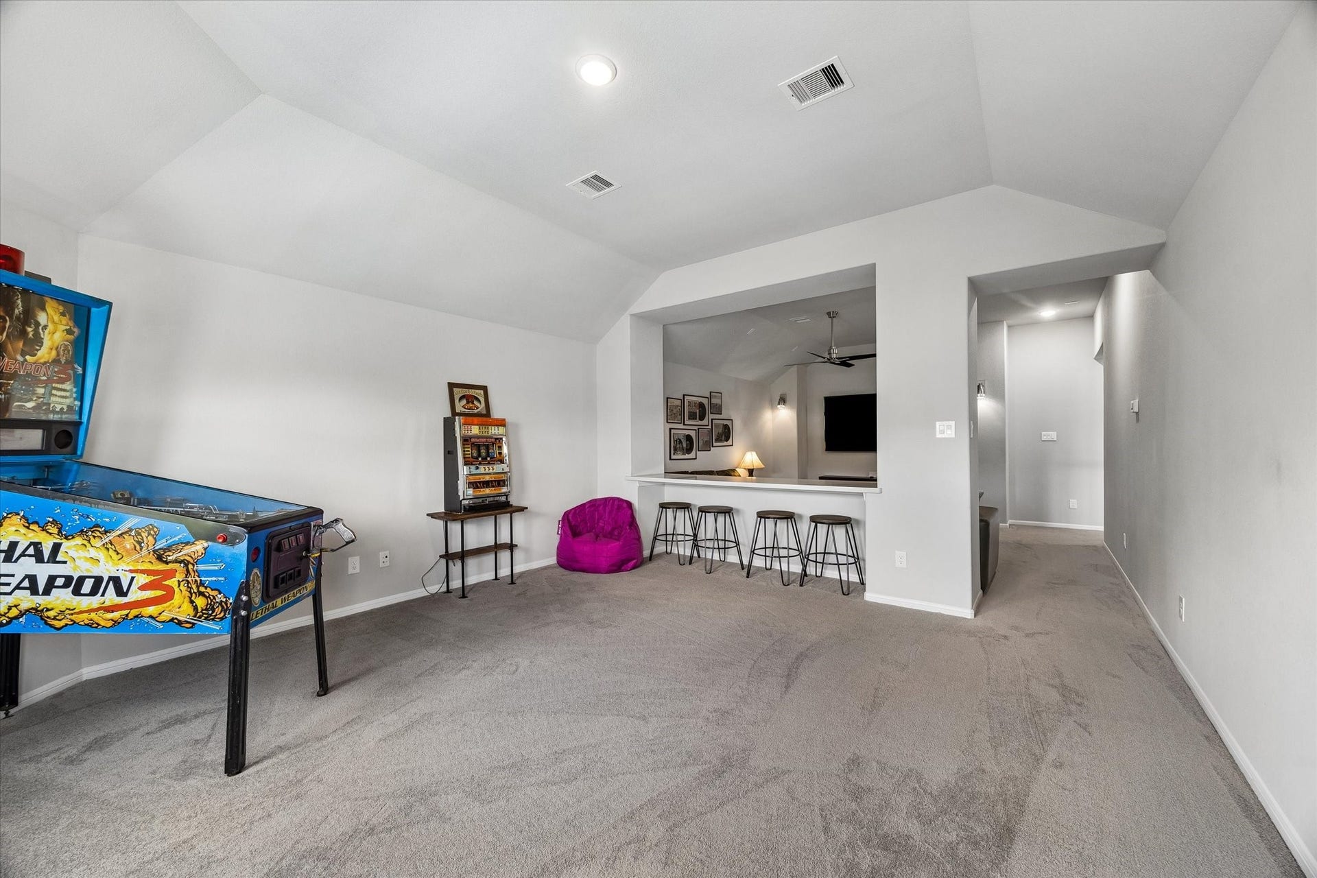 21322 Prairie Plains Lane, Richmond, TX 77406 Game room off the media room provides fabulous play area for kids/teens with vaulted ceilings and windows to the southern views