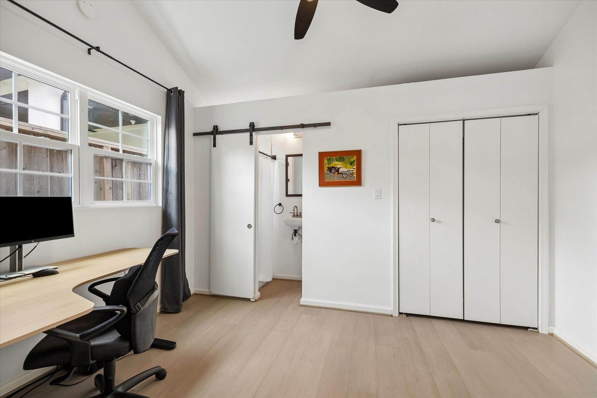 1232 Chantilly Lane, Houston, TX 77018 Garage apartment bedroom with generous closet space, natural light, and an ensuite bathroom for added privacy and convenience.