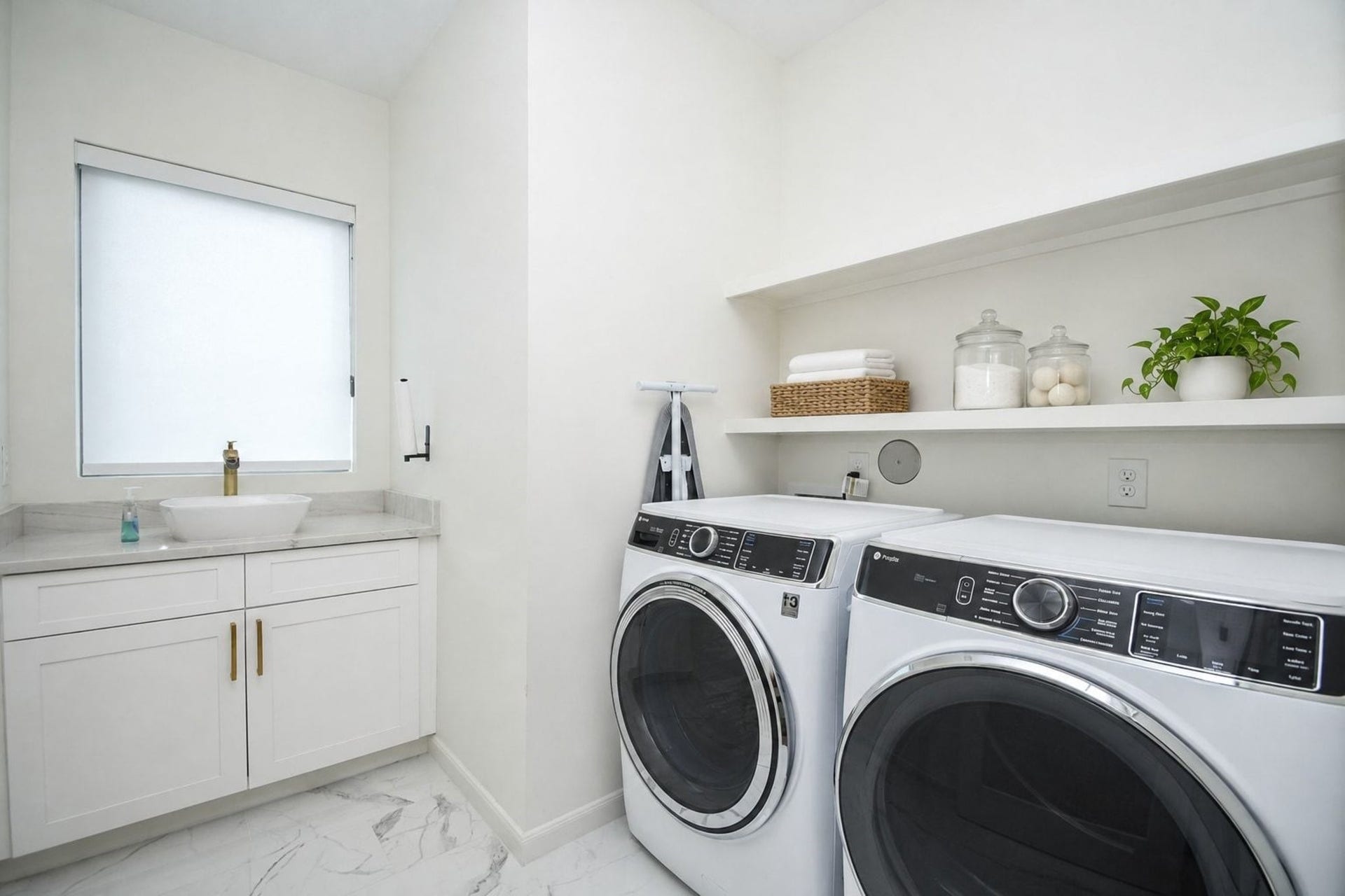 4031 Lanark Lane, #B, Houston, TX 77025 Your roomy utility space easily hosts dual appliances, with the addition of a counter top sink and big window --- nice surroundings on laundry day!