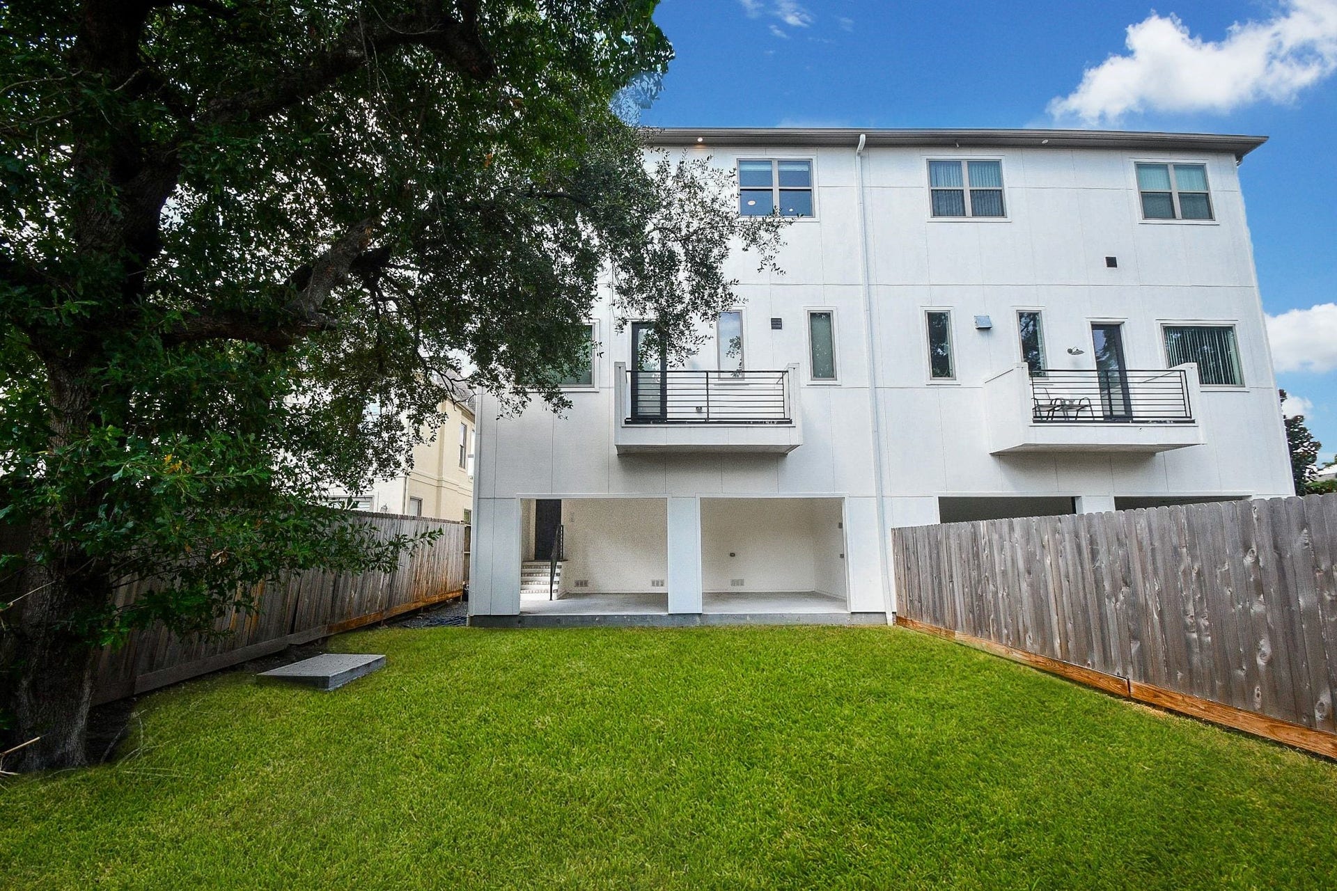 4031 Lanark Lane, #B, Houston, TX 77025 This back yard view offers tons of green space and privacy fencing to lend comfort and ease to your family and entertaining time out here.