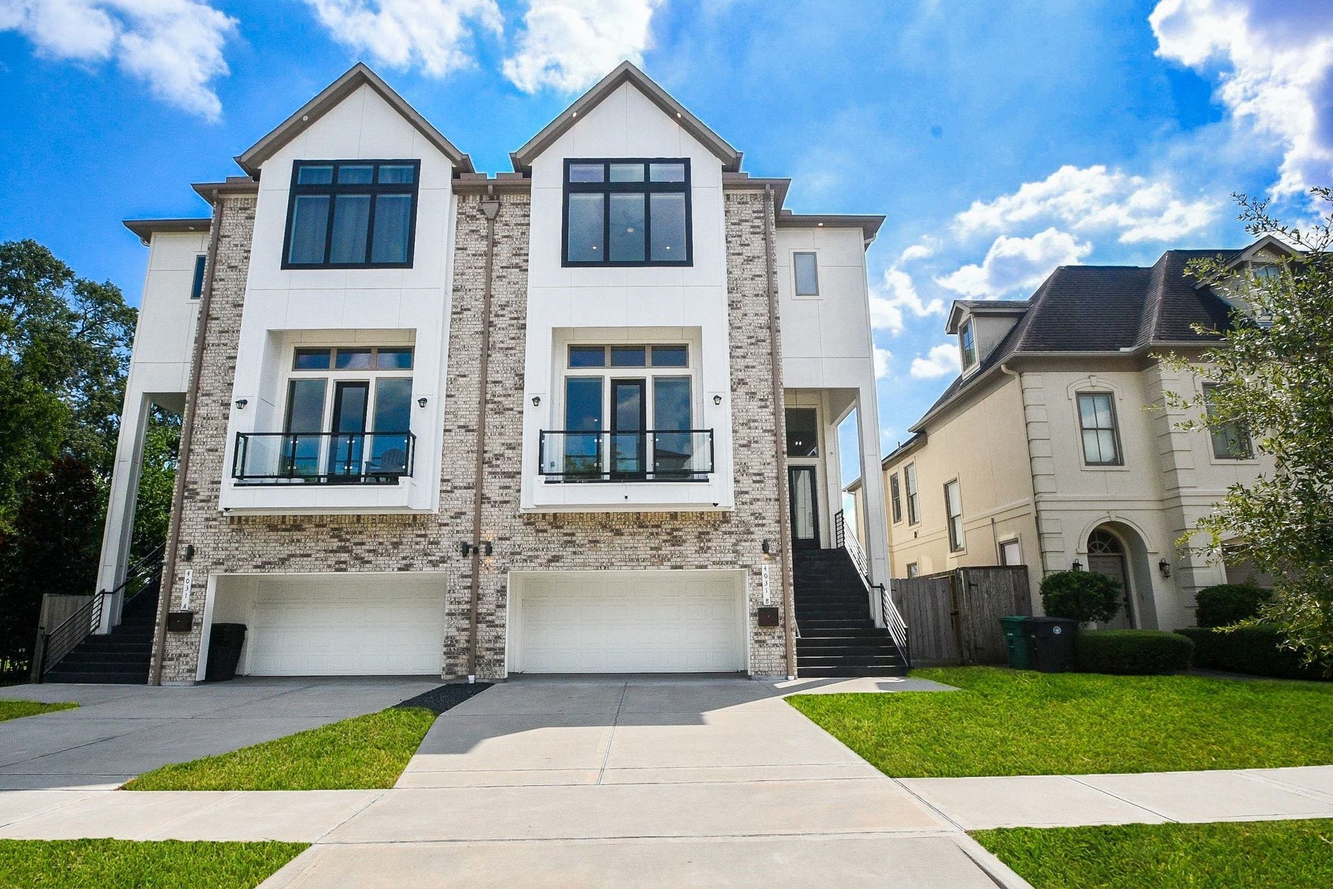 4031 Lanark Lane, #B, Houston, TX 77025 Gorgeous blue skies and warming sun create a lush natural canvas for this spectacular contemporary brick jewel located at 4031 Lanark Lane, #B, Houston, TX, in the highly desired Braes Heights neighborhood. Inside, are 4 bedrooms, 4-1/2 baths, all gracing a generous 4,725 square-foot-lot with 3,669 square-feet of interior living space, including an elevator. Shown here is a 4-vehicle garage, easily accessed from inside and out. Also note extra convenient driveway space for guest and other vehicles.