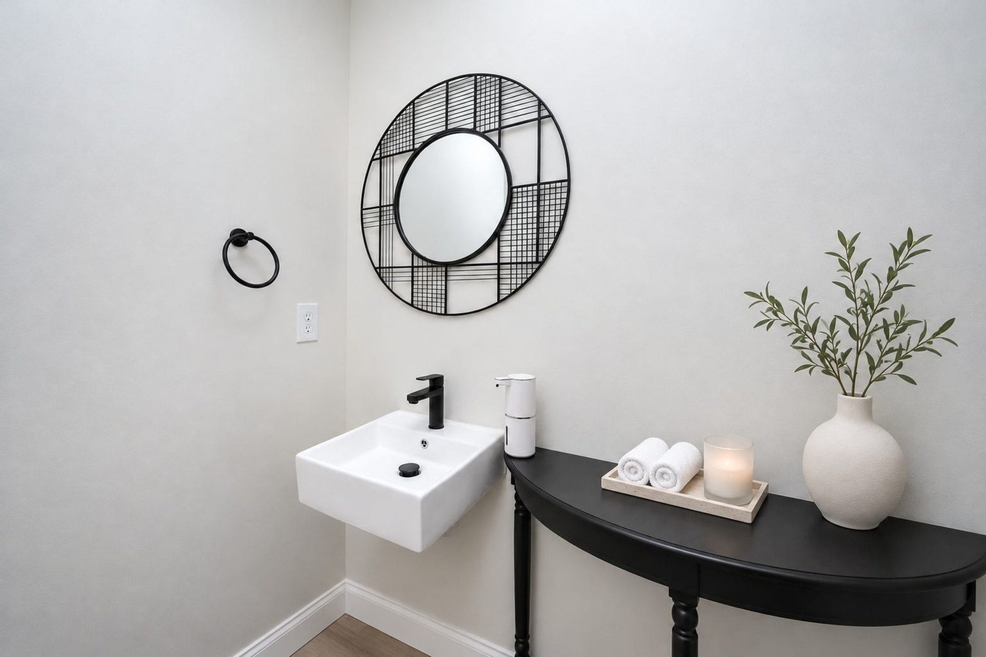 4031 Lanark Lane, #B, Houston, TX 77025 15-This darling half-bath repeats the home's appealing minimalist theme.