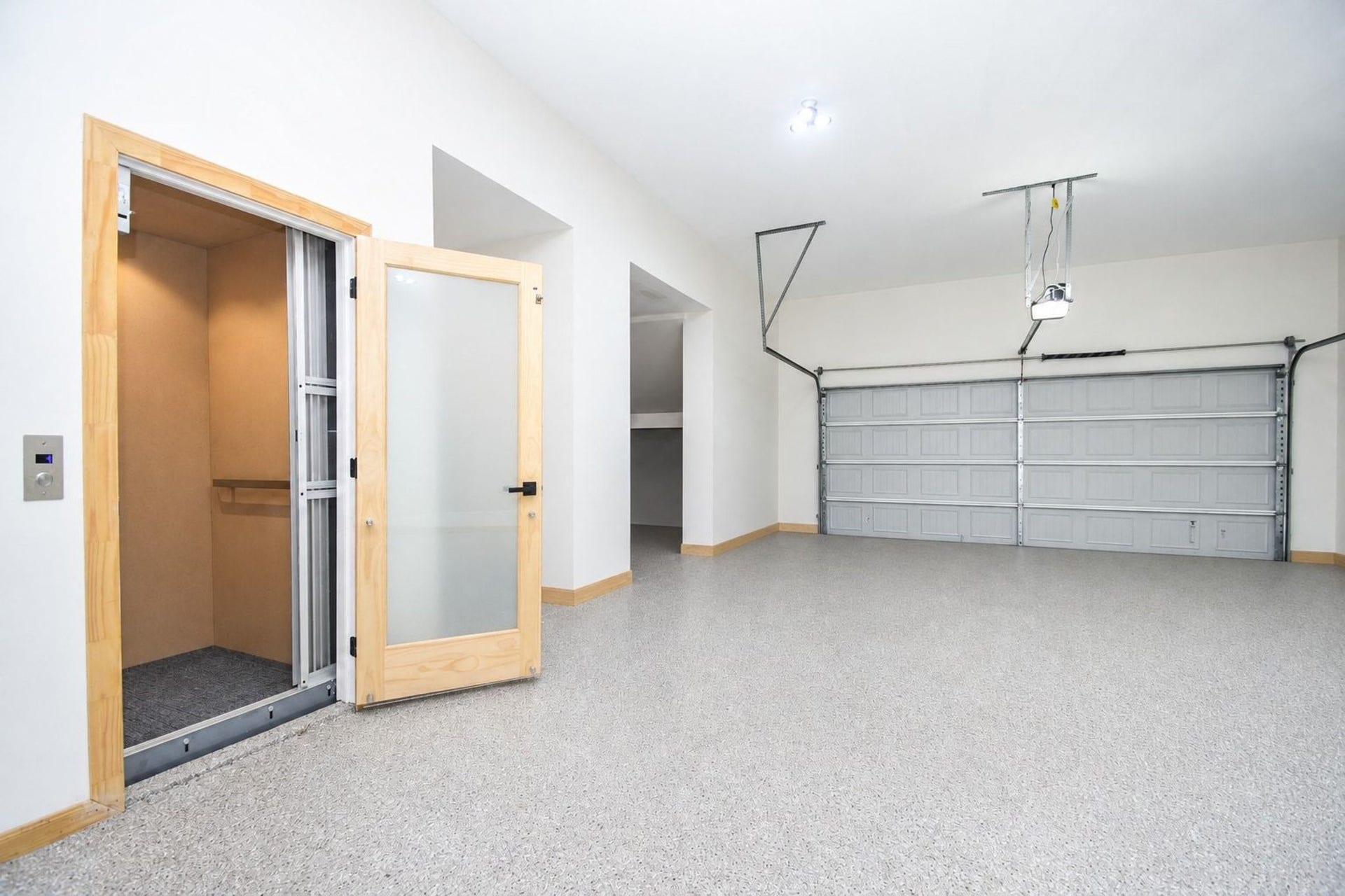 4031 Lanark Lane, #B, Houston, TX 77025 The four car garage is huge and spotless with epoxy flooring and extra storage space. Access to Elevator.