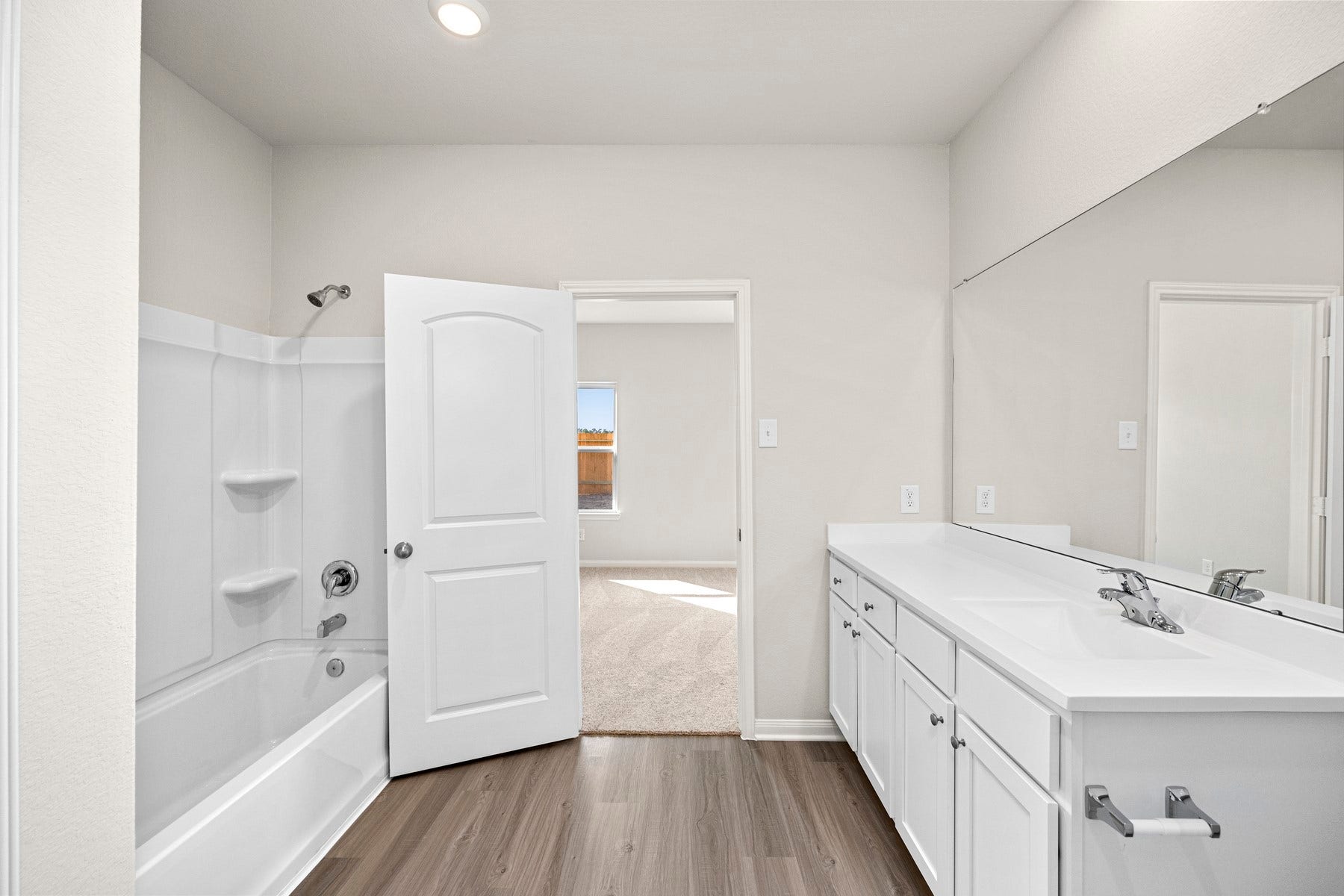 6414 Autumn Equinox Drive, Houston, TX 77048 The primary bathroom has tons of room with a walk-in closet and plenty of storage space.