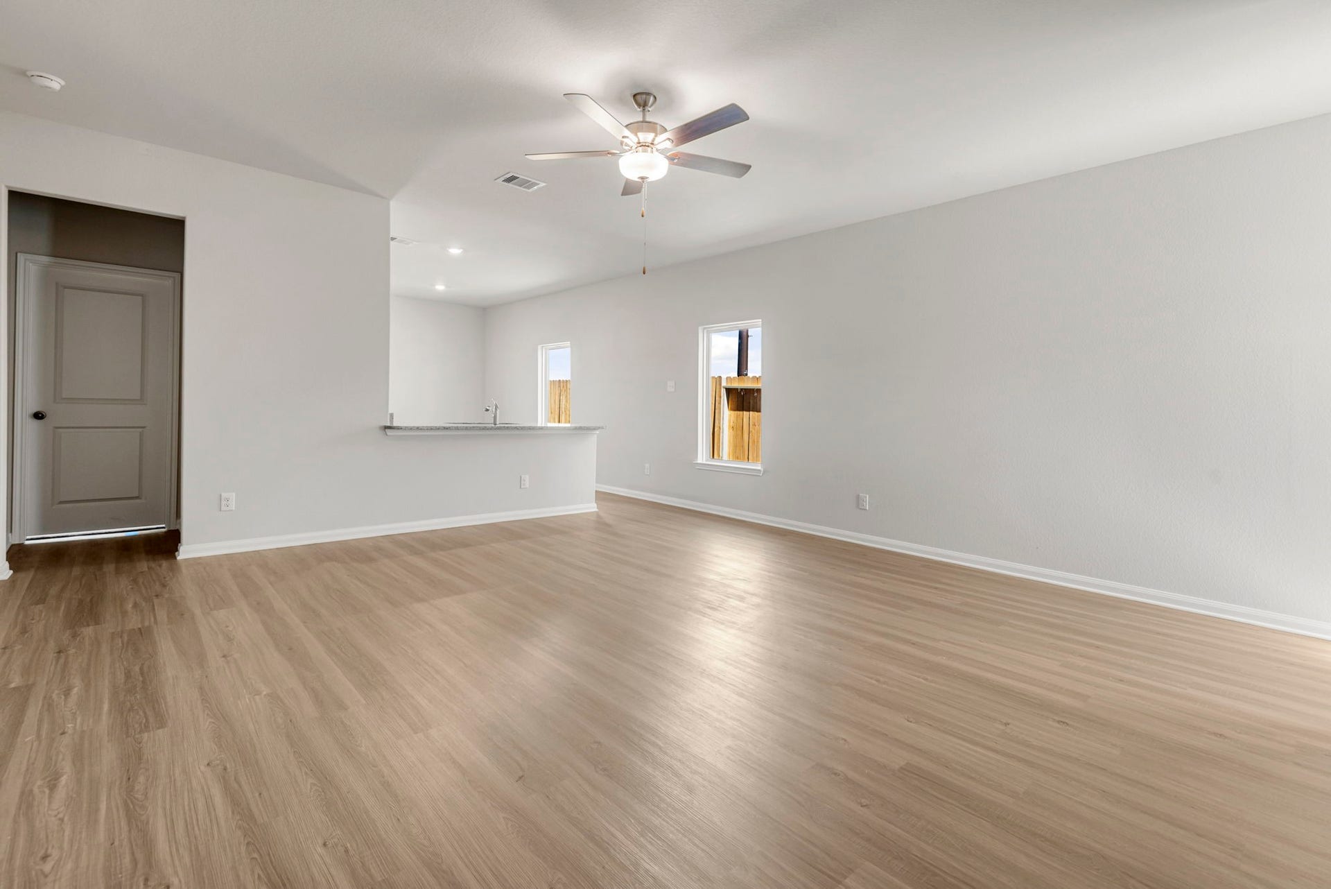 6414 Autumn Equinox Drive, Houston, TX 77048 Spacious living room, open to the kitchen and dining area.
