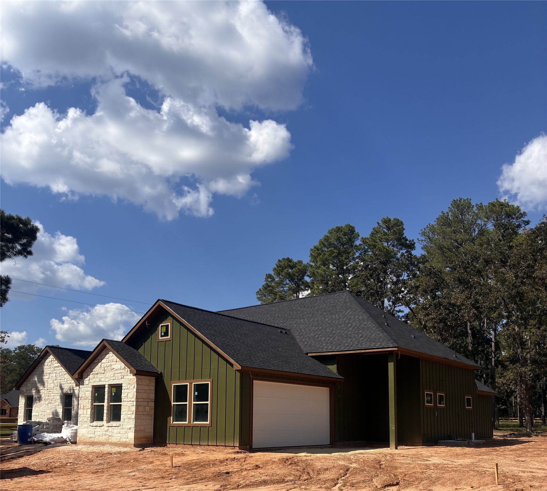 Featuring The light-filled family room flows beautifully into the dining area and gourmet kitchen, featuring quartz countertops and stainless-steel appliances.