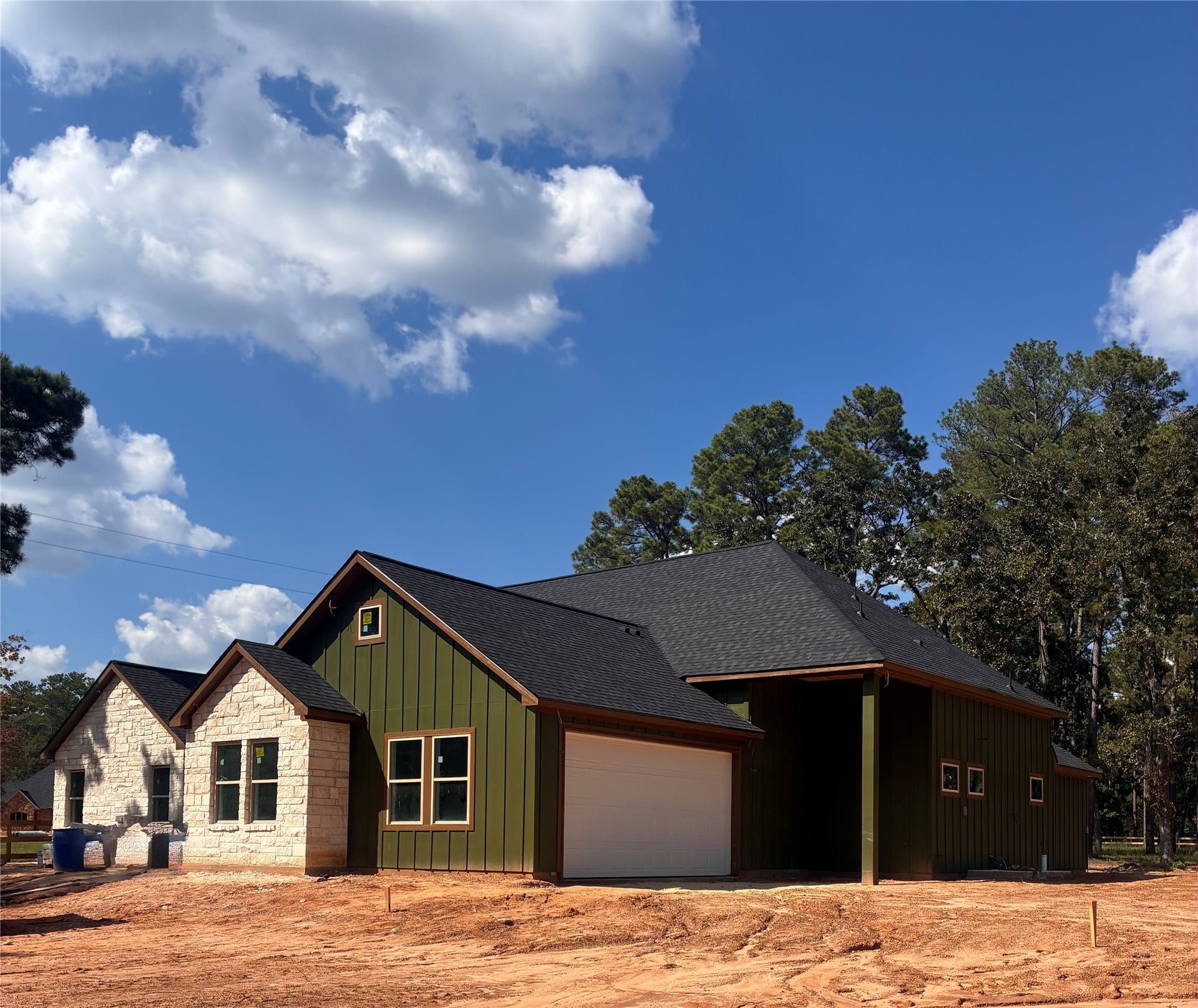 Nestled in a desirable community, this stunning Under Construction Home offers modern elegance and effortless living.