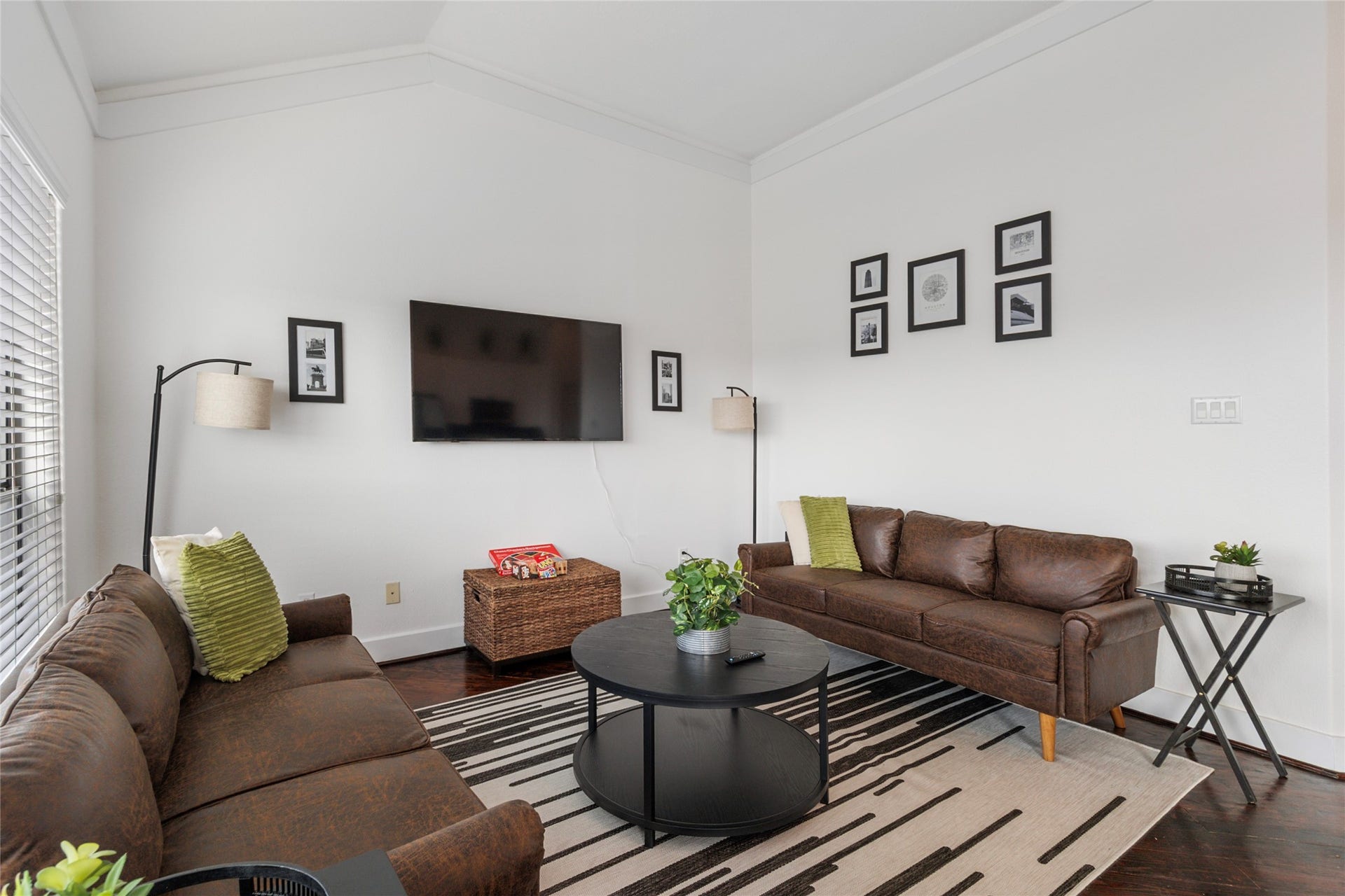 Open living area with high ceilings and plenty of seating