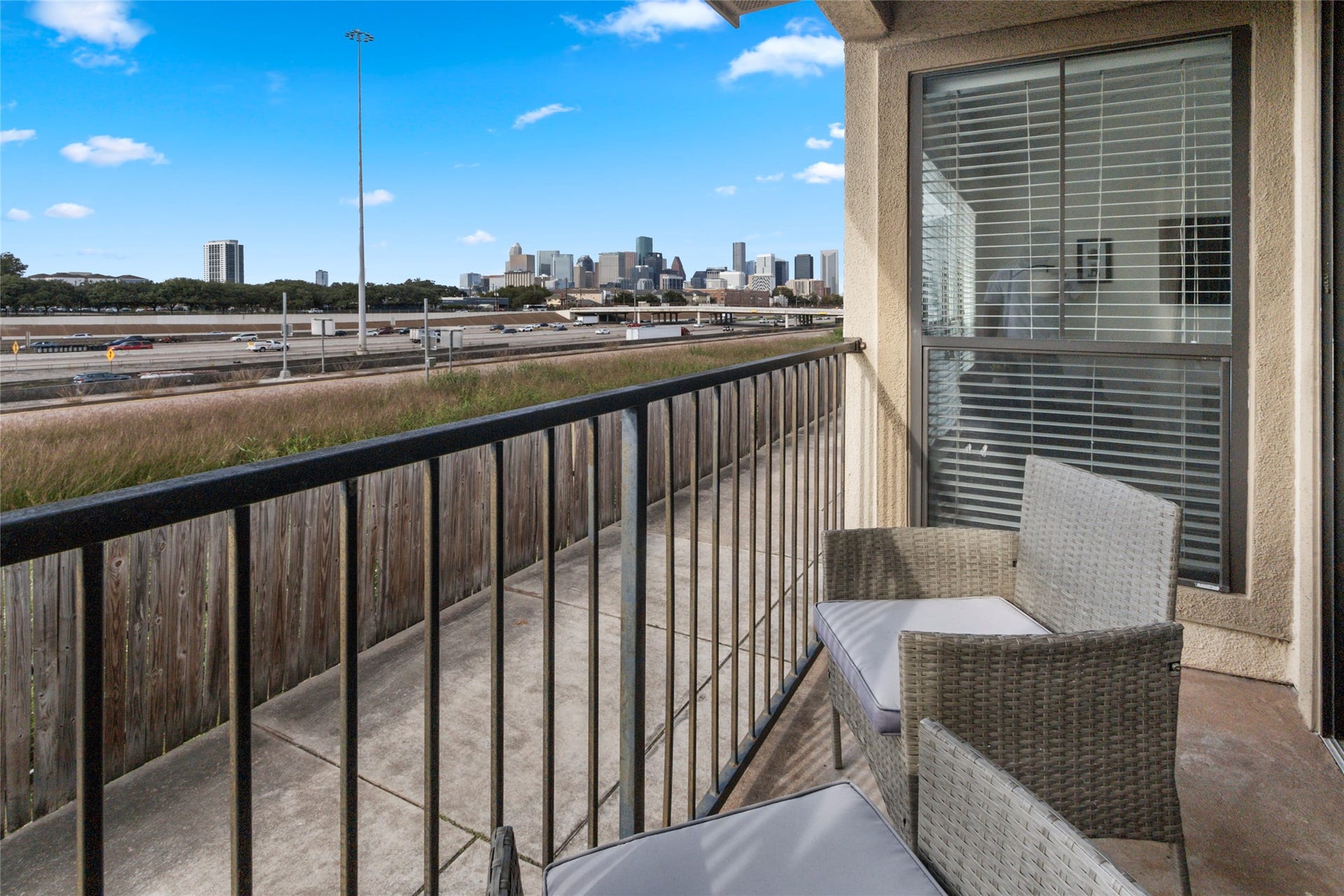 Private balcony with sweeping downtown skyline views