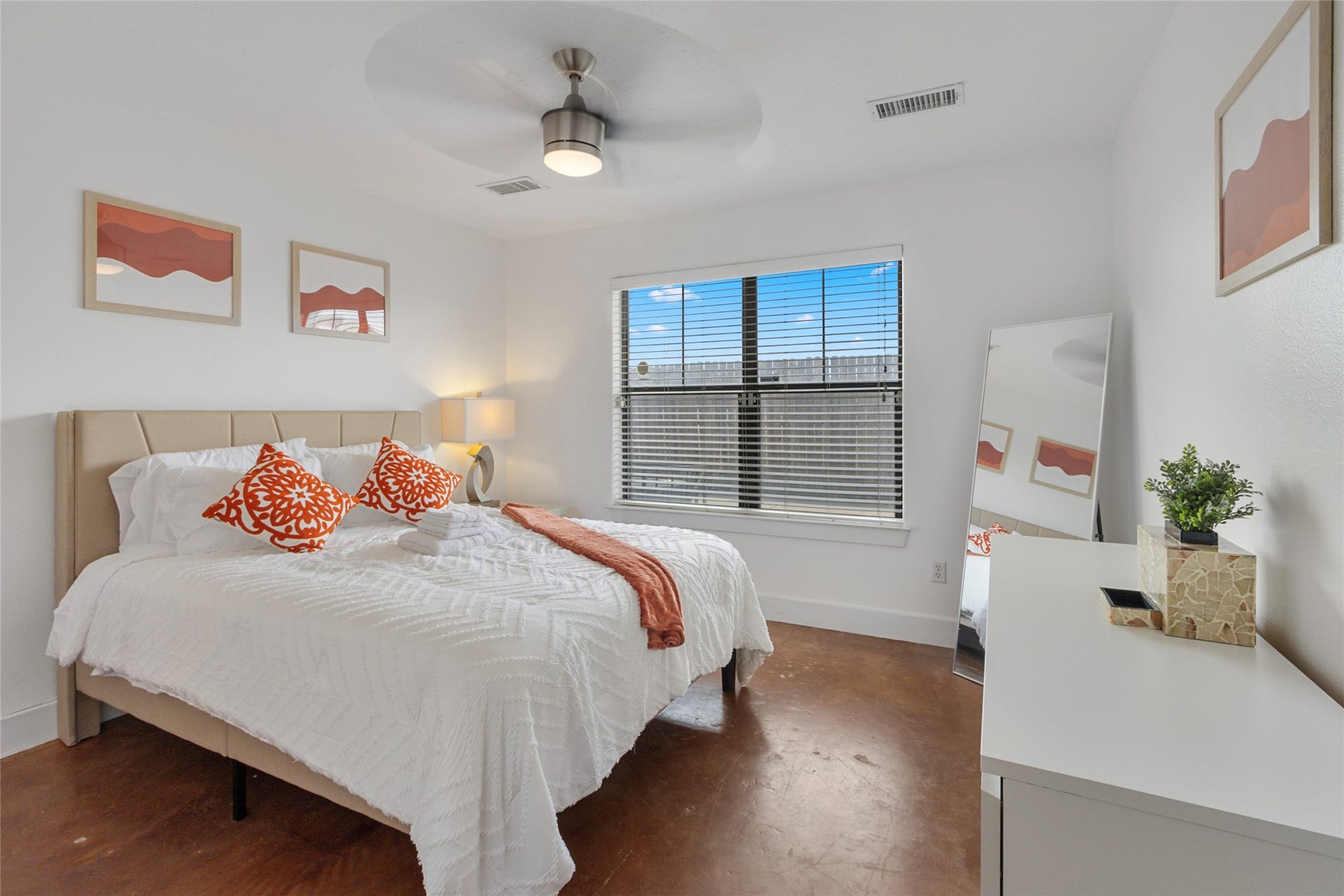 Bright bedroom with large windows