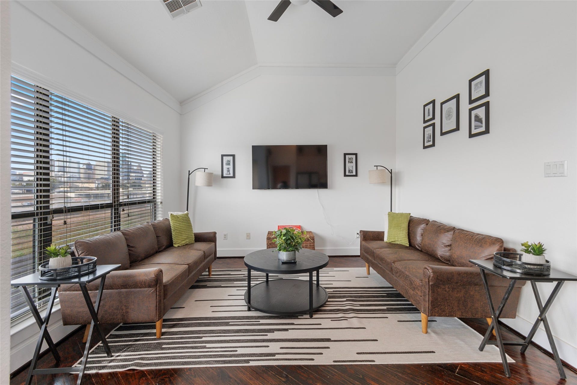 Alternate view of the living room and large windows.