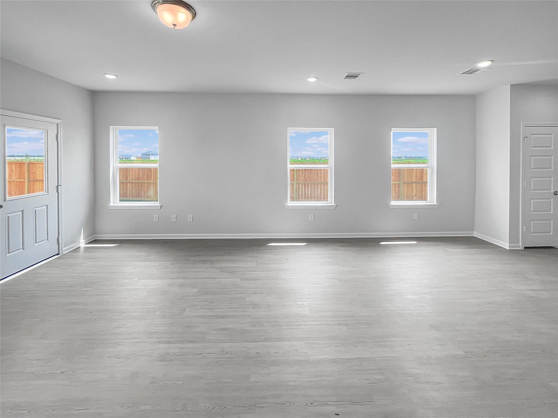 3442 Brushy Marsh Drive, Richmond, TX 77406 The Waring III- Dining Area and Family Room. Sample image for illustration; upgrades, options, and colors may vary.