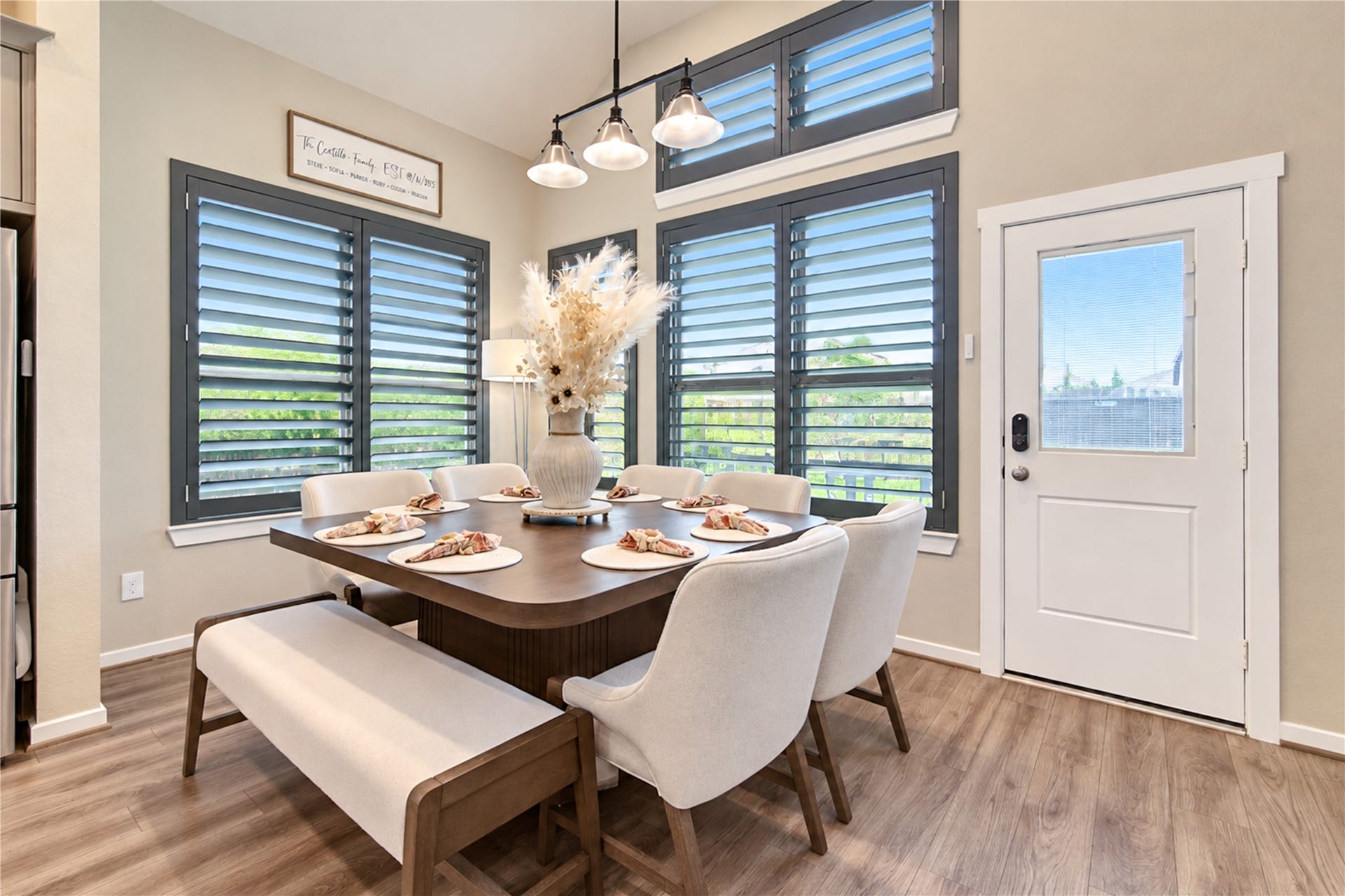 24911 Via Arabella Lane, Richmond, TX 77406 A bright, welcoming dining area with high ceilings, plantation shutters and easy access to the backyard.