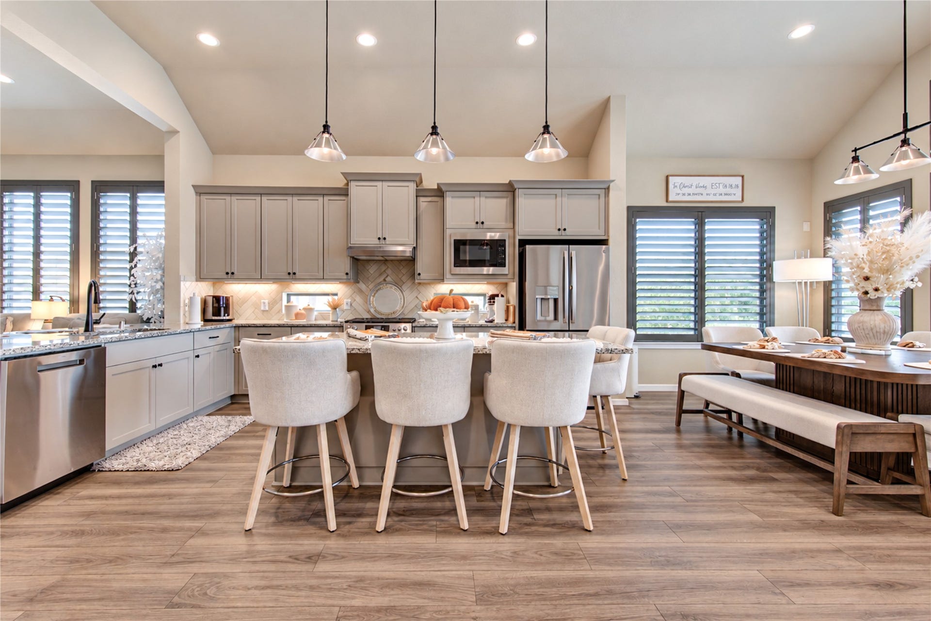 24911 Via Arabella Lane, Richmond, TX 77406 A well-designed kitchen with a spacious island, abundant cabinetry and a seamless connection to the family room.