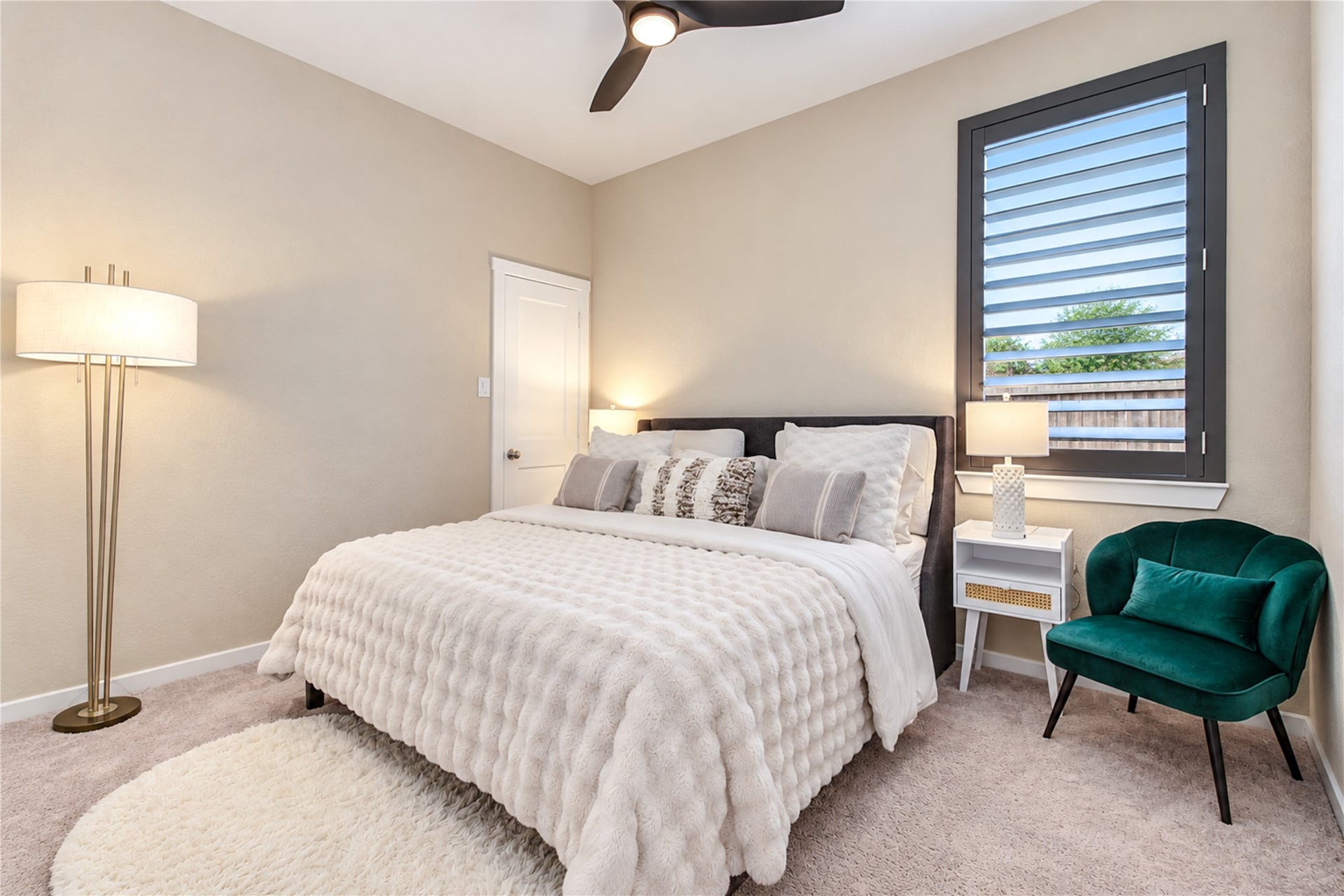 24911 Via Arabella Lane, Richmond, TX 77406 Another inviting bedroom with natural light, plantation shutters and a ceiling fan.