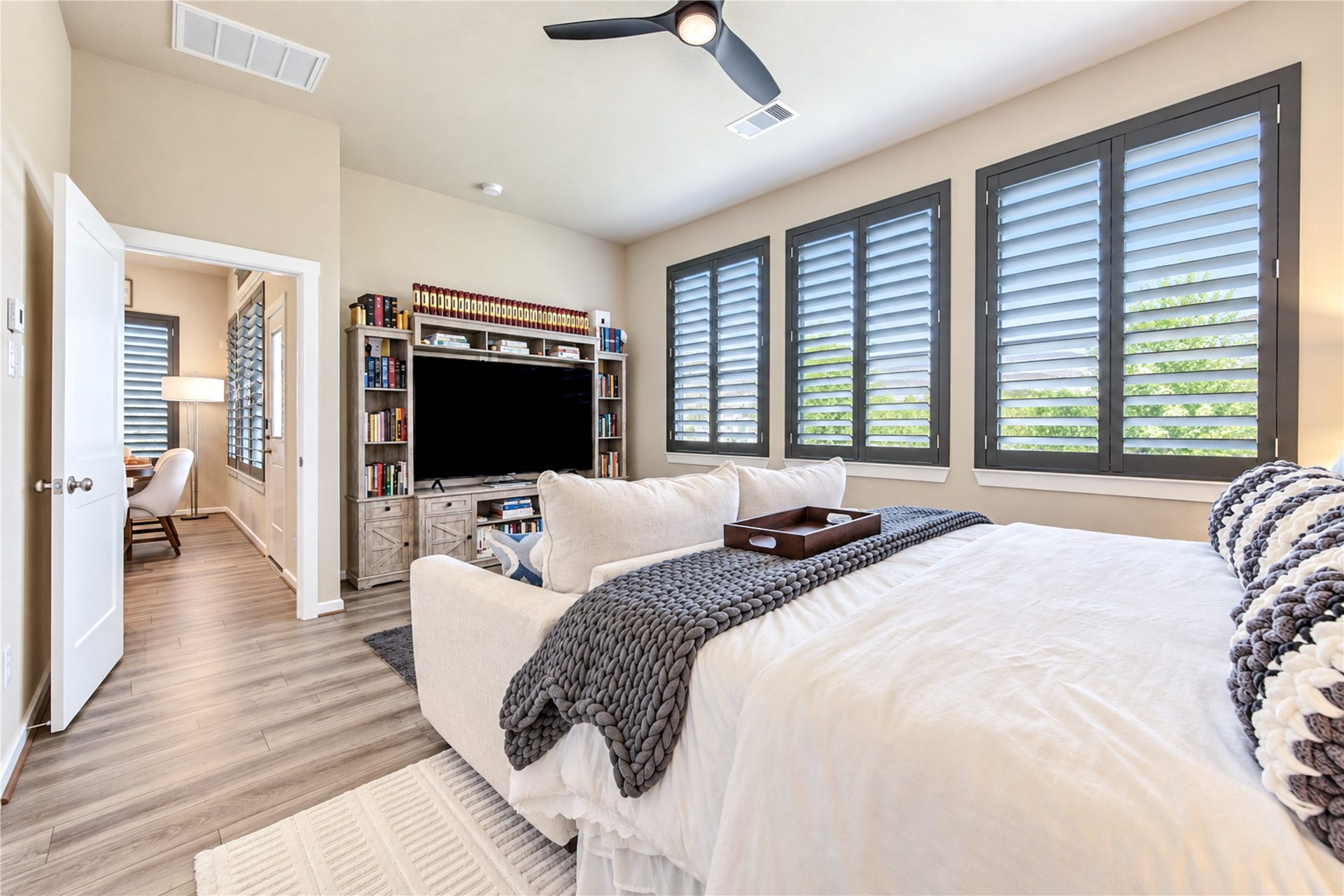 24911 Via Arabella Lane, Richmond, TX 77406 Another view of the primary suite, highlighting its generous proportions and beautiful windows.