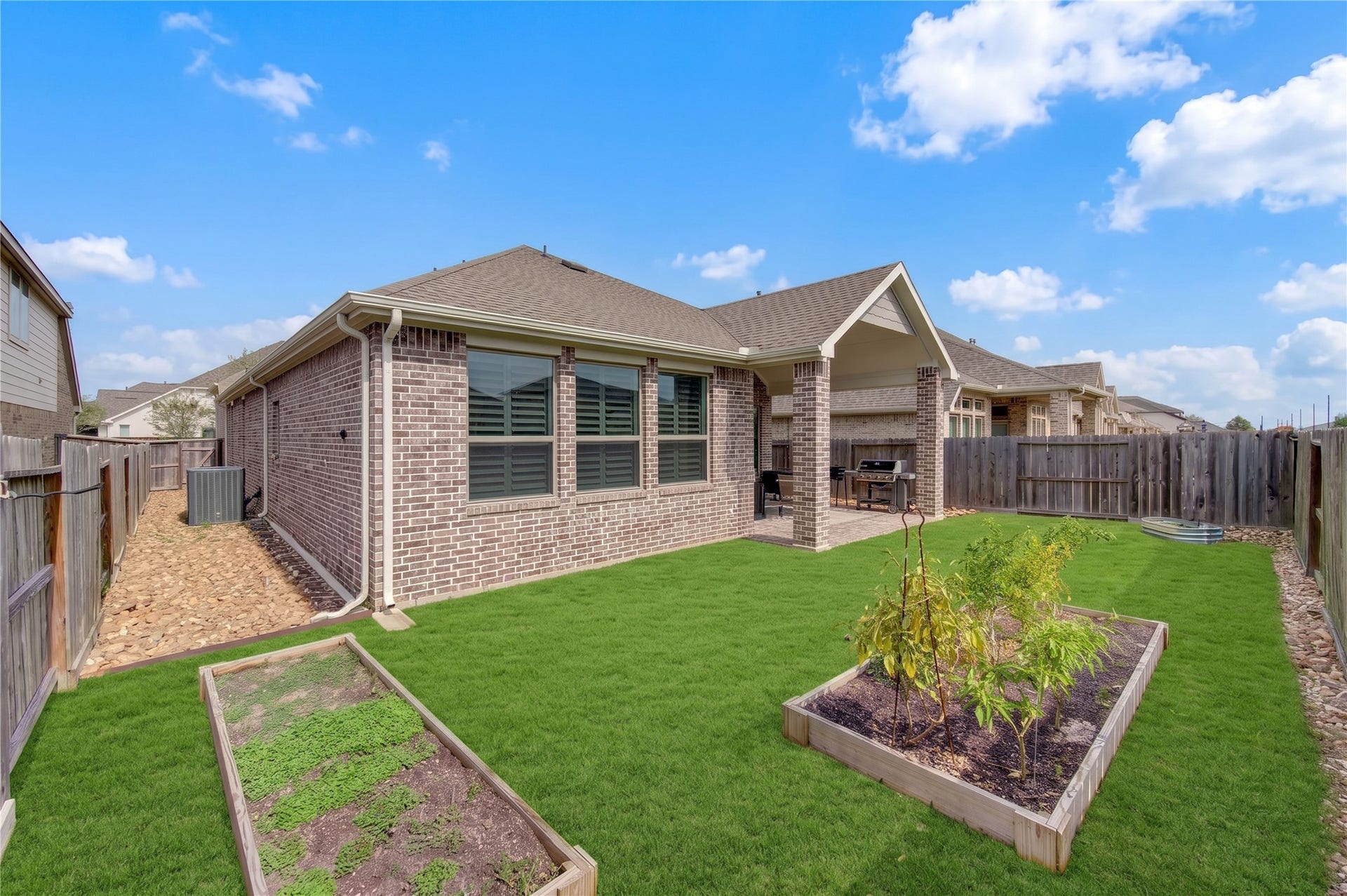 24911 Via Arabella Lane, Richmond, TX 77406 A spacious backyard with room to enjoy outdoor living, gardening or play.
