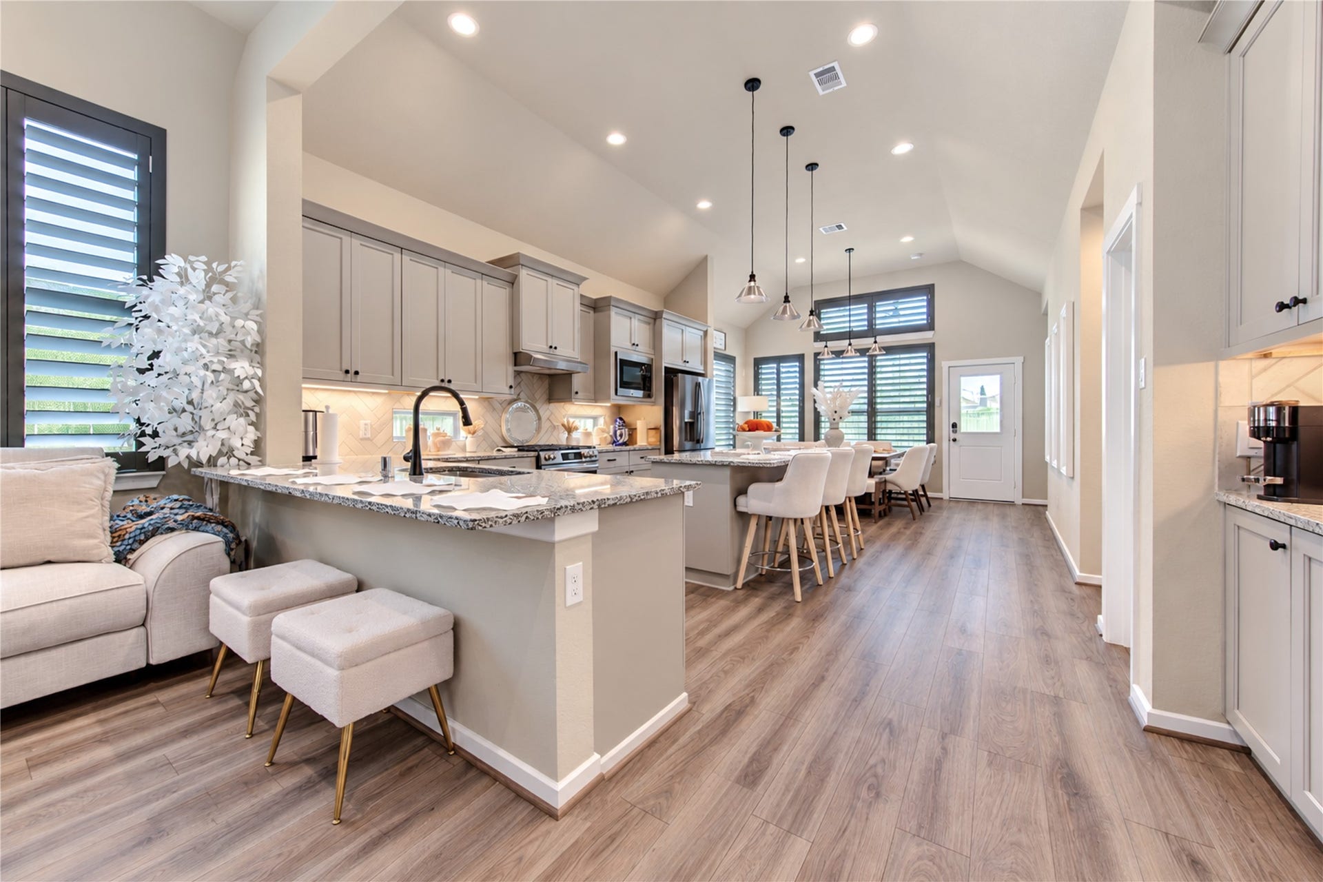 24911 Via Arabella Lane, Richmond, TX 77406 The kitchen offers plenty of workspace, beautiful cabinetry and an easy flow into the breakfast area.