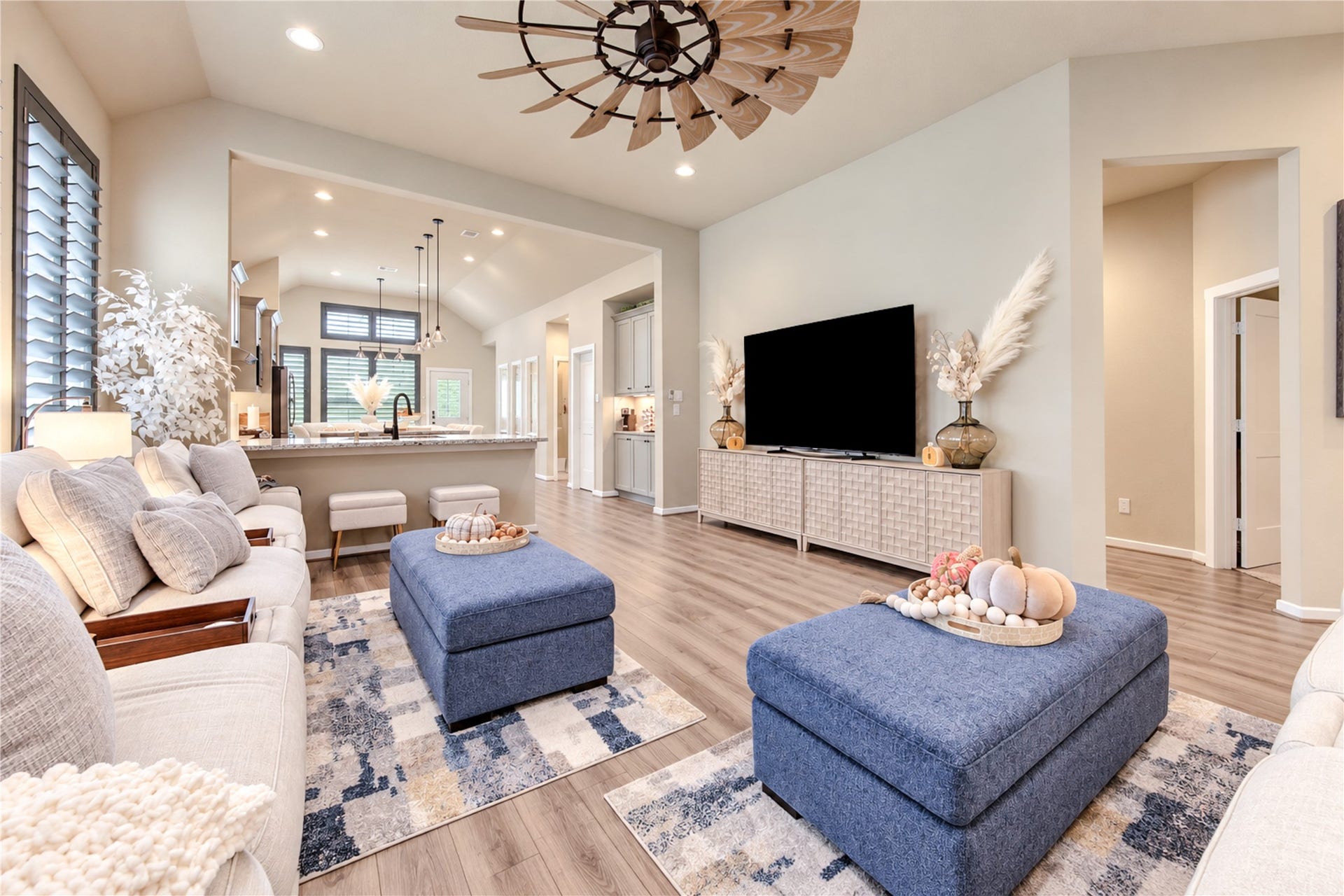24911 Via Arabella Lane, Richmond, TX 77406 Another perspective of the family room, highlighting the generous space, high ceilings and easy flow into the kitchen.