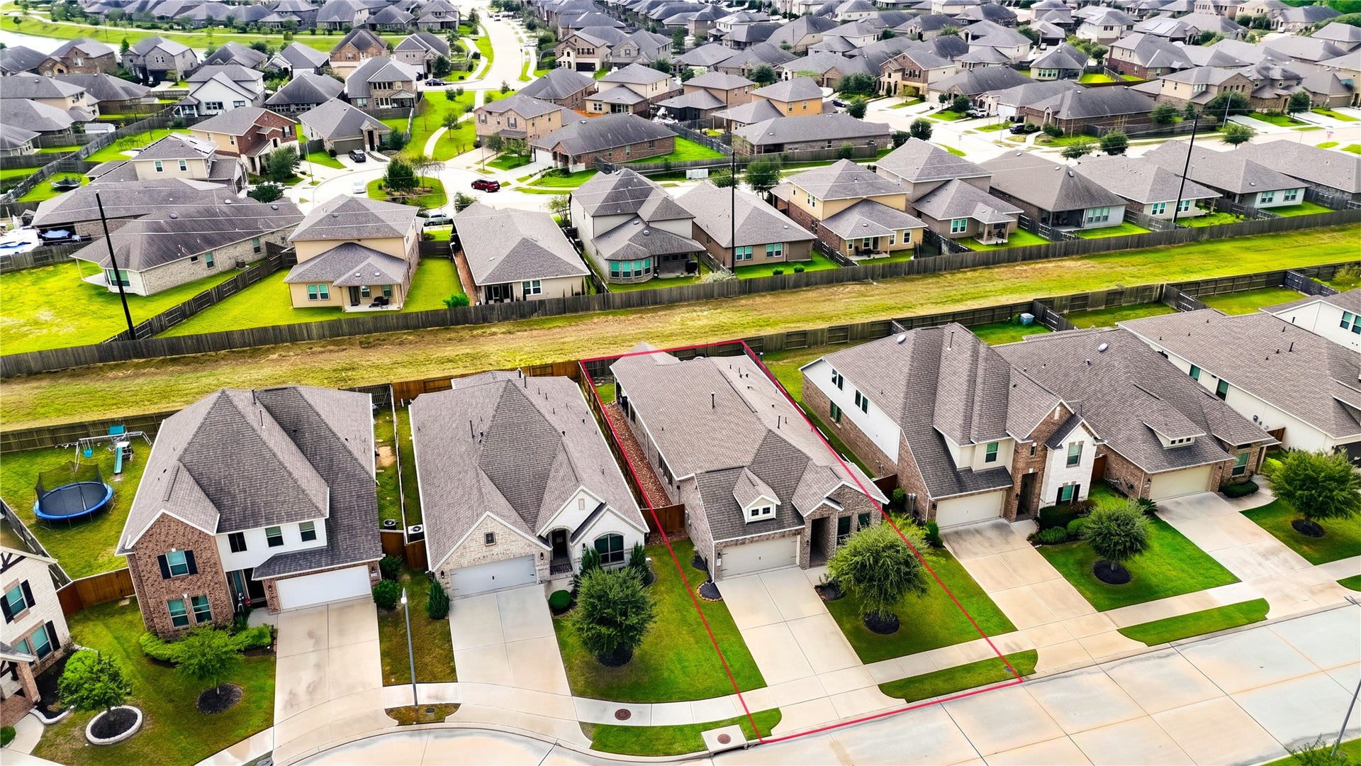 24911 Via Arabella Lane, Richmond, TX 77406 An elevated view highlighting the home's single-story design, lot boundaries and surrounding properties.