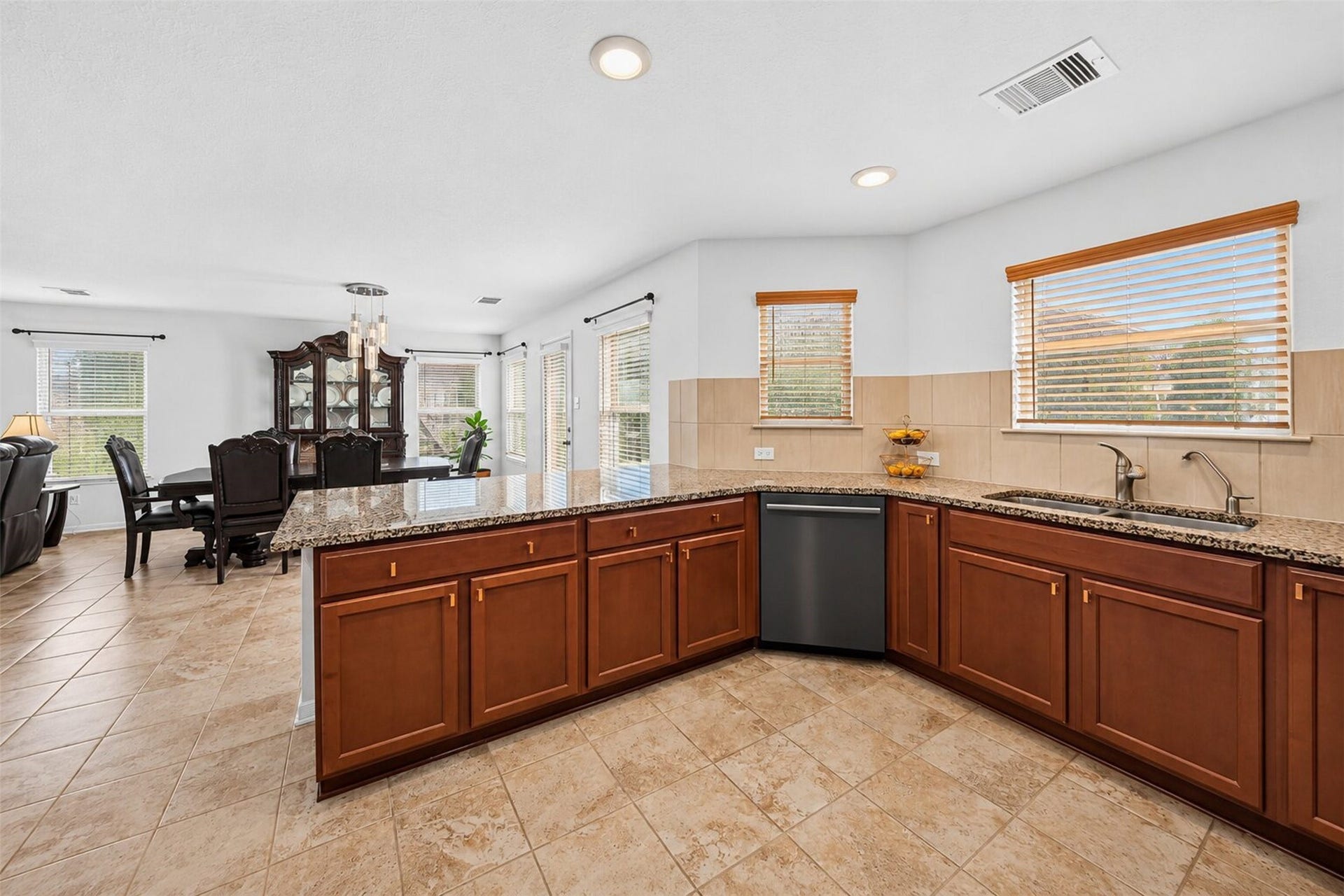 2627 White Bluff Lane, Houston, TX 77038 Kitchen with brand name appliances and granite countertops