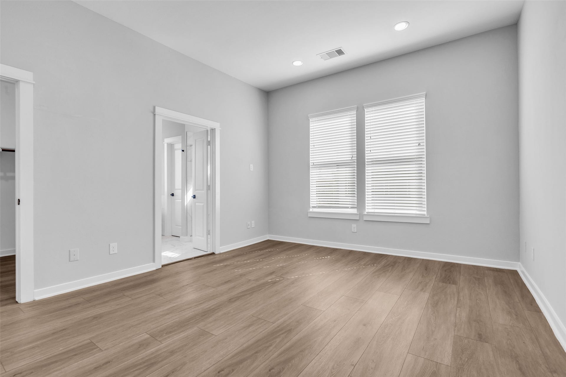 8474 Berry Green Lane, Houston, TX 77022 Wake up to natural light from the double window, with the ensuite bath just steps away.