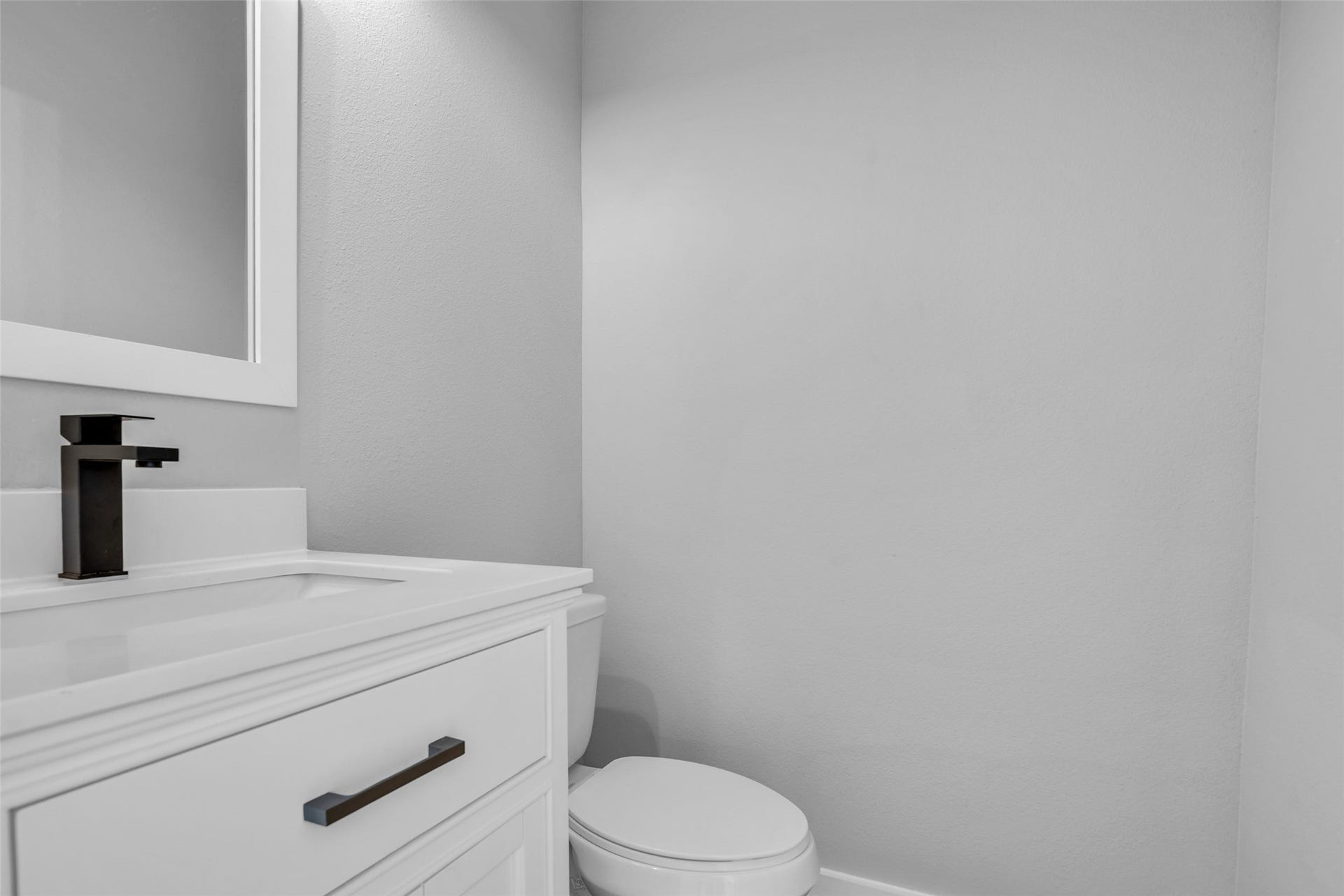 8474 Berry Green Lane, Houston, TX 77022 A first-floor powder room so guests never have to head upstairs.