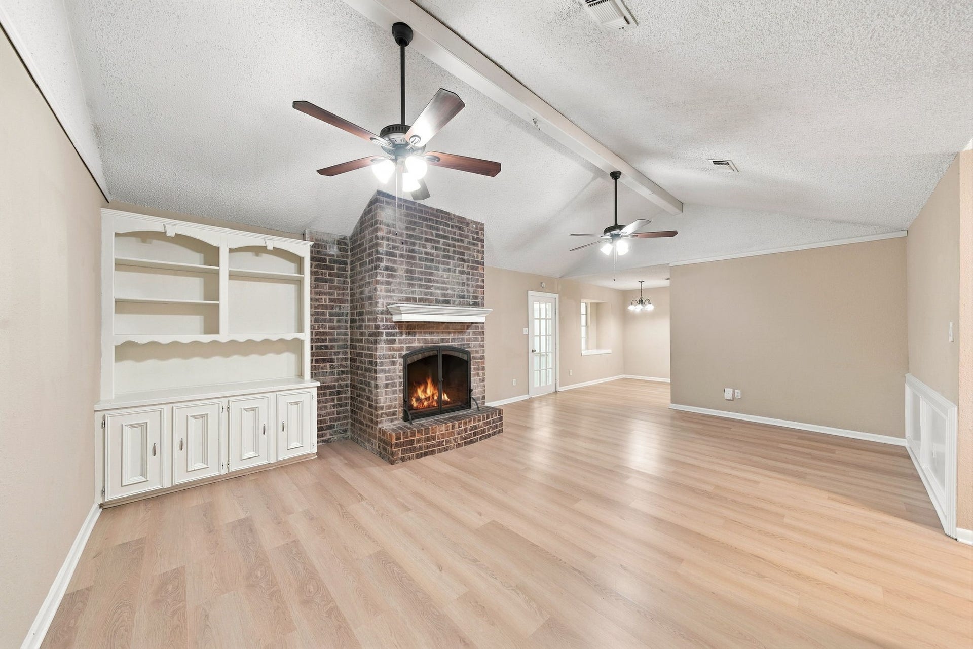 13317 Rene Circle, Santa Fe, TX 77510 Livingroom with wood burning fireplace